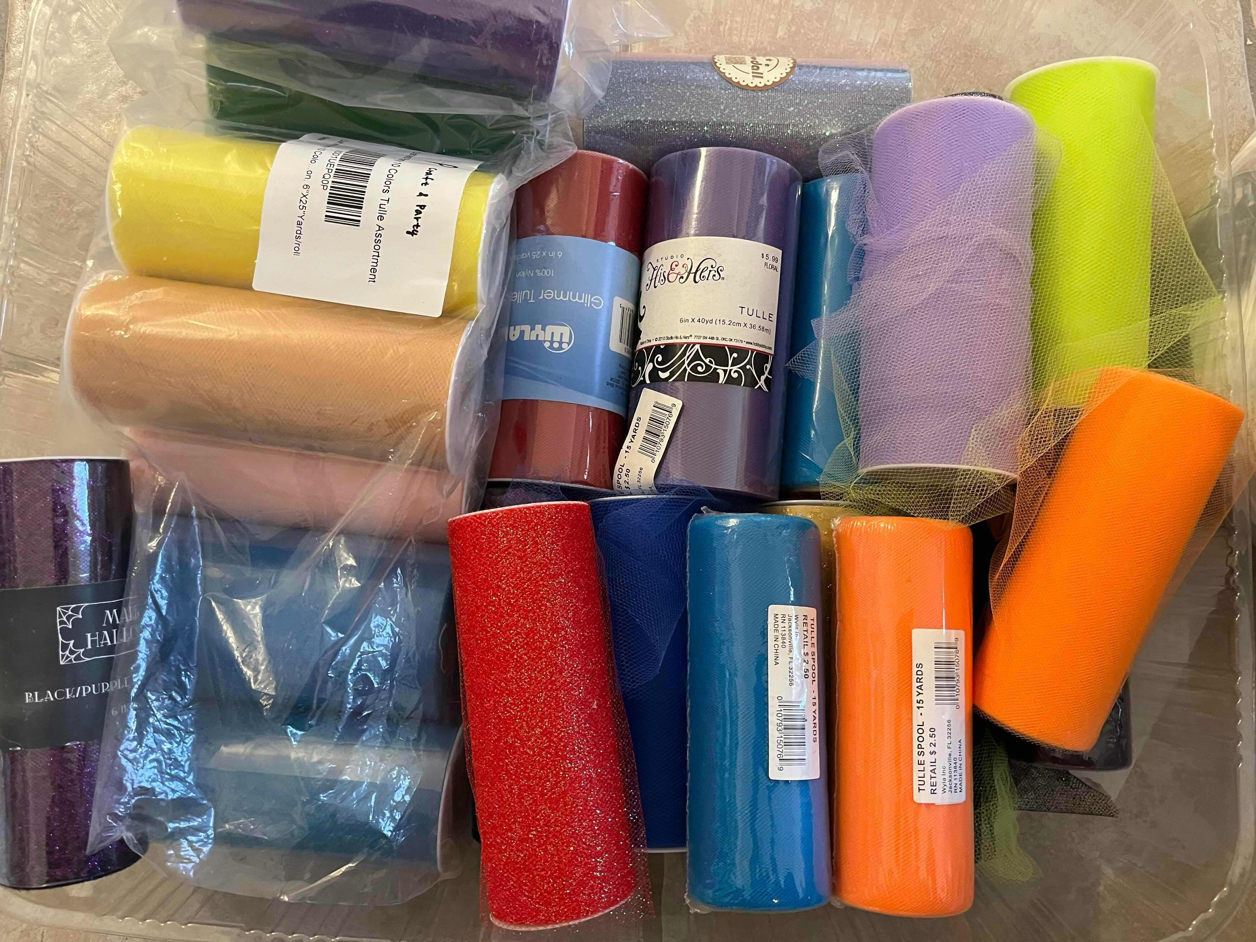 Photo 1 of CONTAINER AND BAG OF ASSORTED COLORFUL CRAFTING MATERIALS TINSEL AND KNITTING YARN