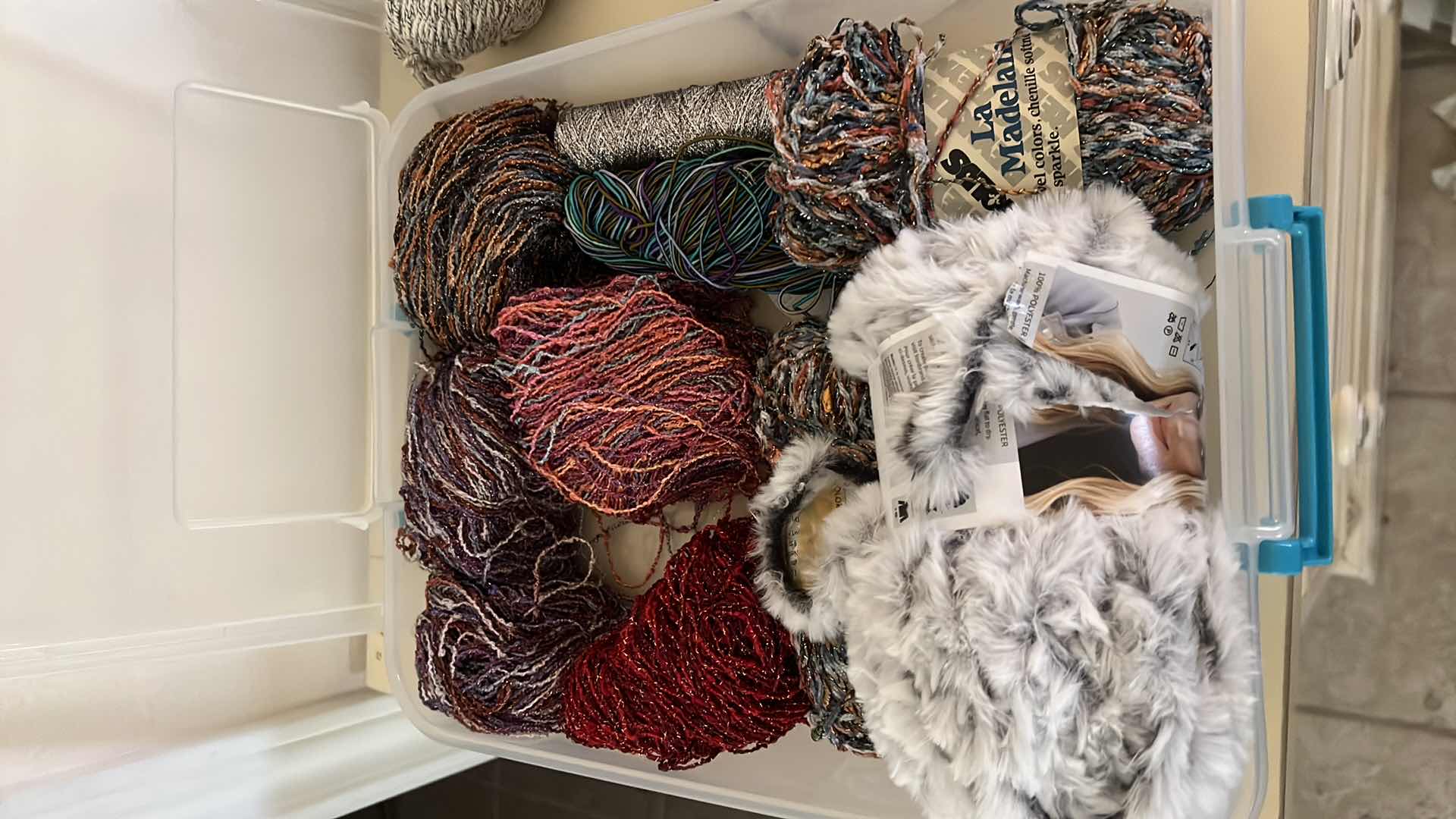 Photo 1 of TOTE OF SPECIALTY YARN INCLUDING  LA MADELAINE AND MORE