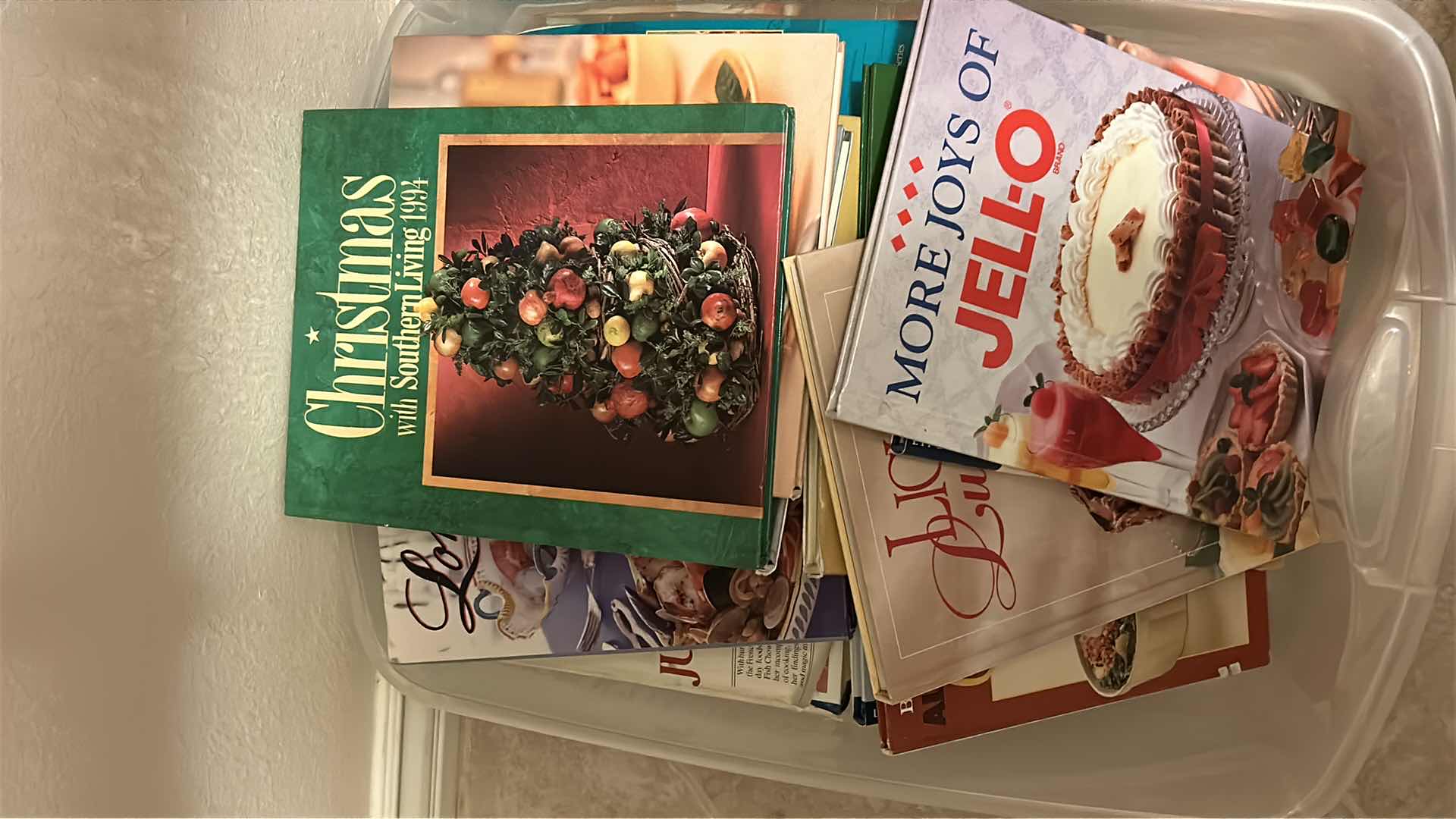 Photo 1 of 2- CONTAINERS OF ASSORTED COOKBOOKS
