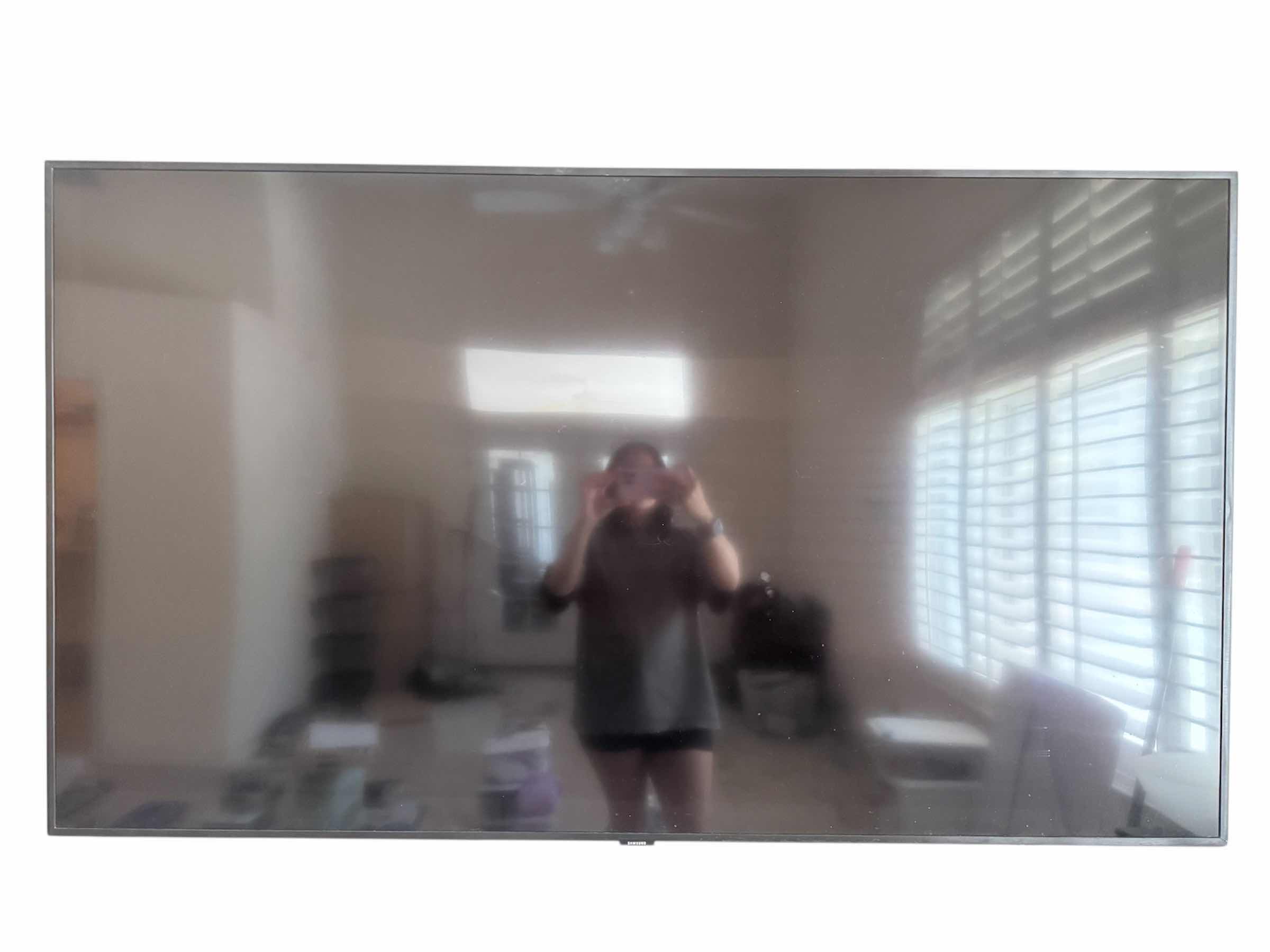 Photo 1 of 56” SAMSUNG TV MODEL NO. QN65Q60RAF