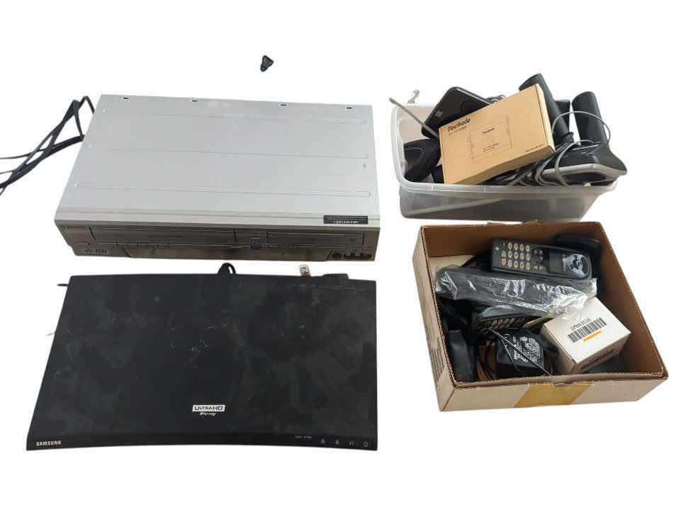 Photo 1 of VINTAGE EMERSON VHS AND DVD PLAYER, SAMSUNG ULTRA HD BLU- RAY PLAYER, ASSORTED VINTAGE PHONES