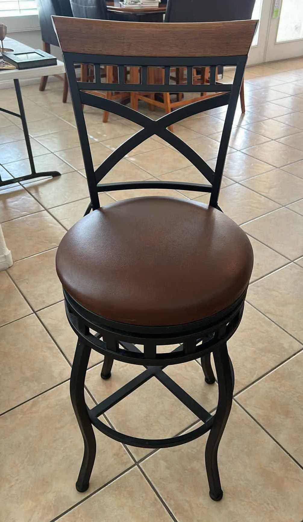 Photo 1 of BLACK IRON W ASH WOOD TRIM & FAUX LEATHER SEAT SWIVEL HIGH BACK BAR STOOL (SEAT H29")