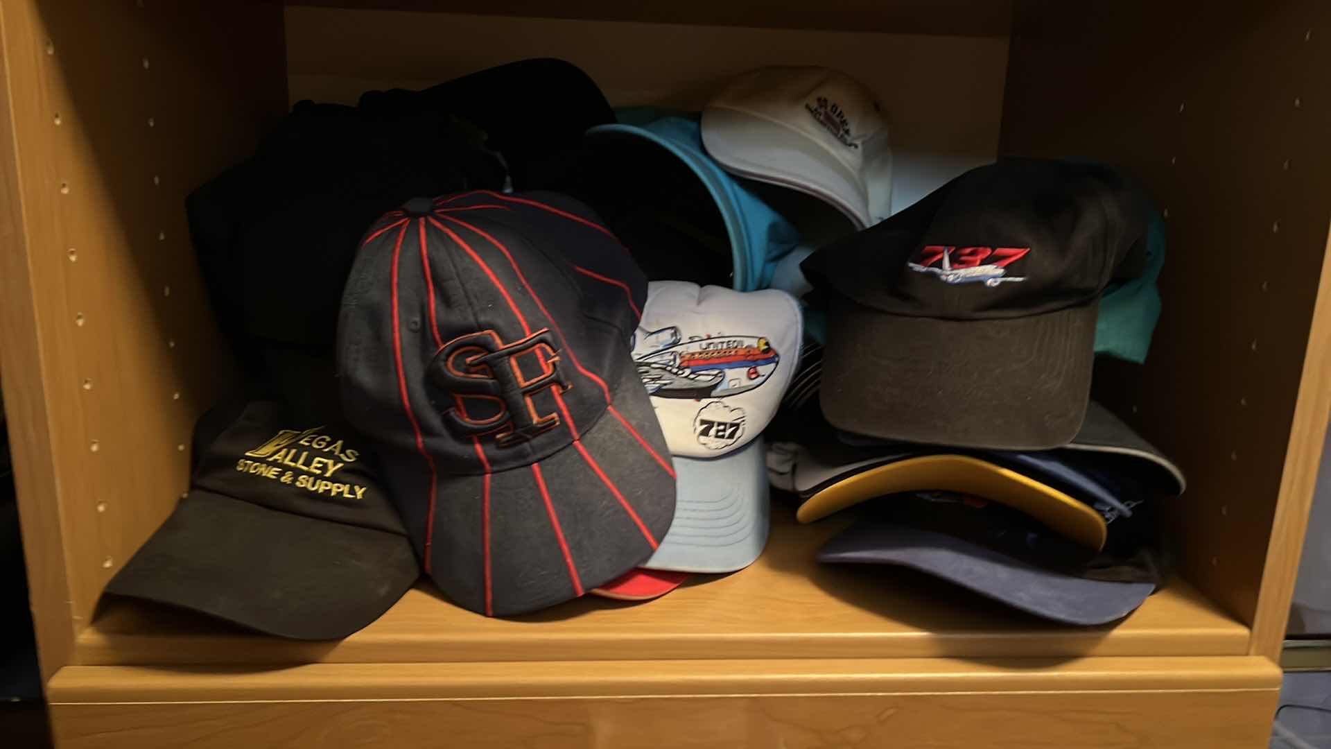 Photo 1 of CONTENTS OF CLOSET SHELF-MEN'S CAPS/HATS