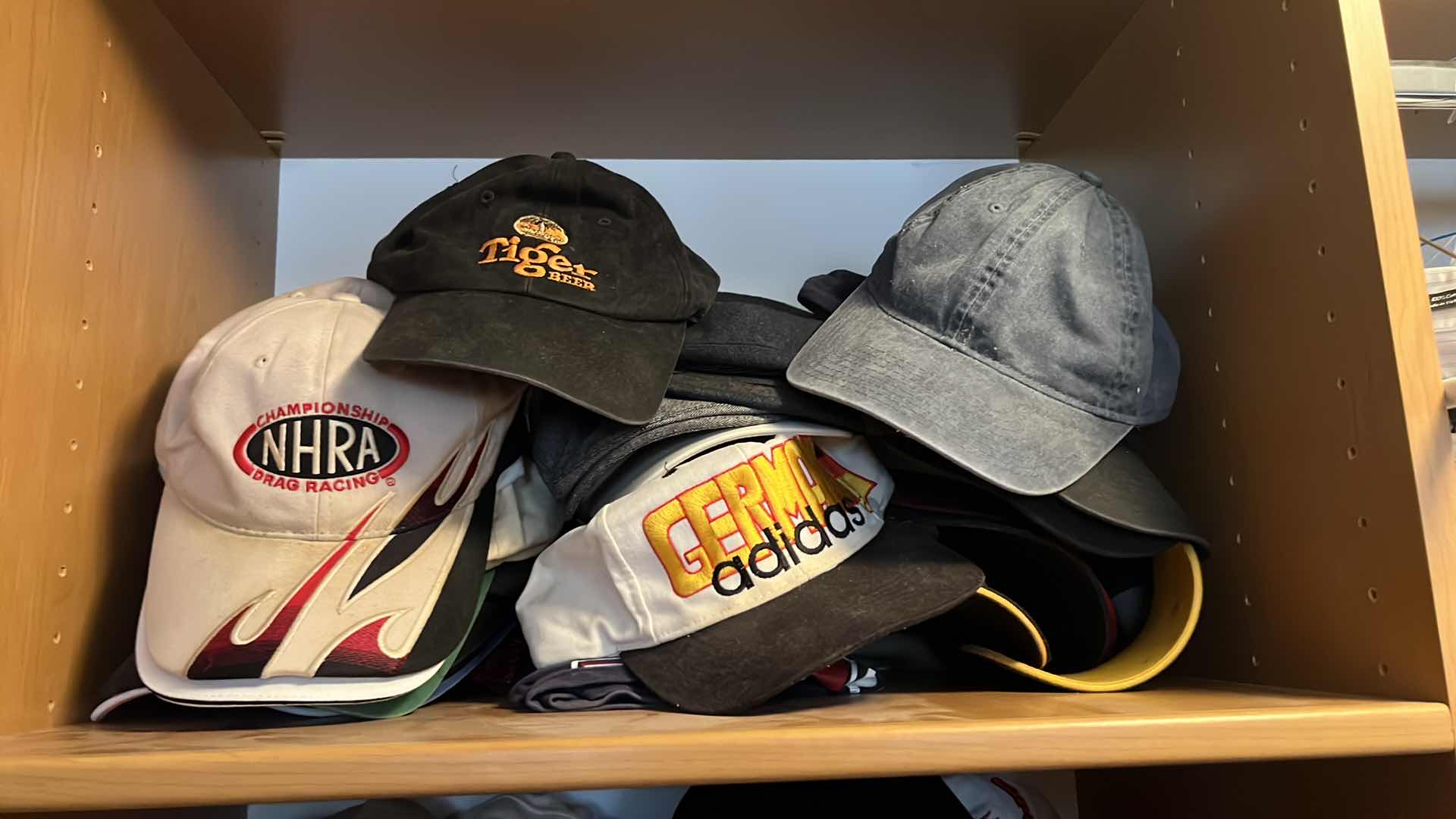 Photo 1 of CONTENTS OF CLOSET SHELF-MEN'S CAPS/HATS