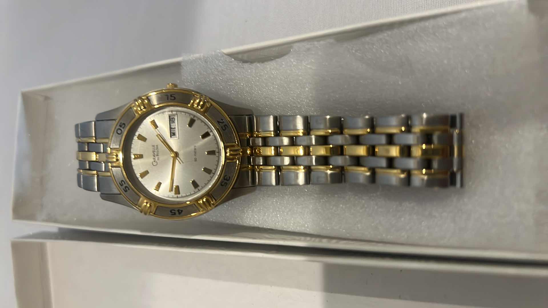 Photo 1 of CARAVELLE BULIVA WATCH UNISEX SILVER GOLD TONE DATE WATCH