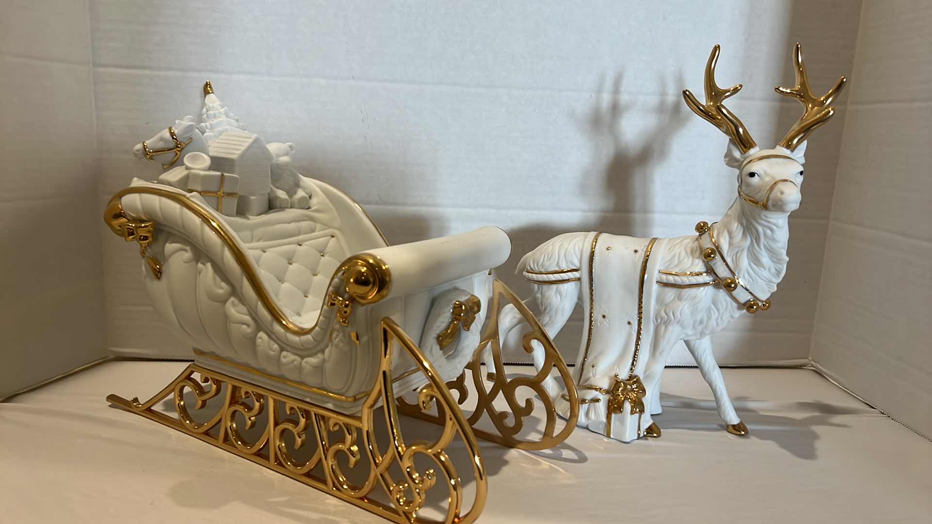 Photo 1 of WHITE W GOLD TRIM CERAMIC SLEIGH & REINDEER H10"