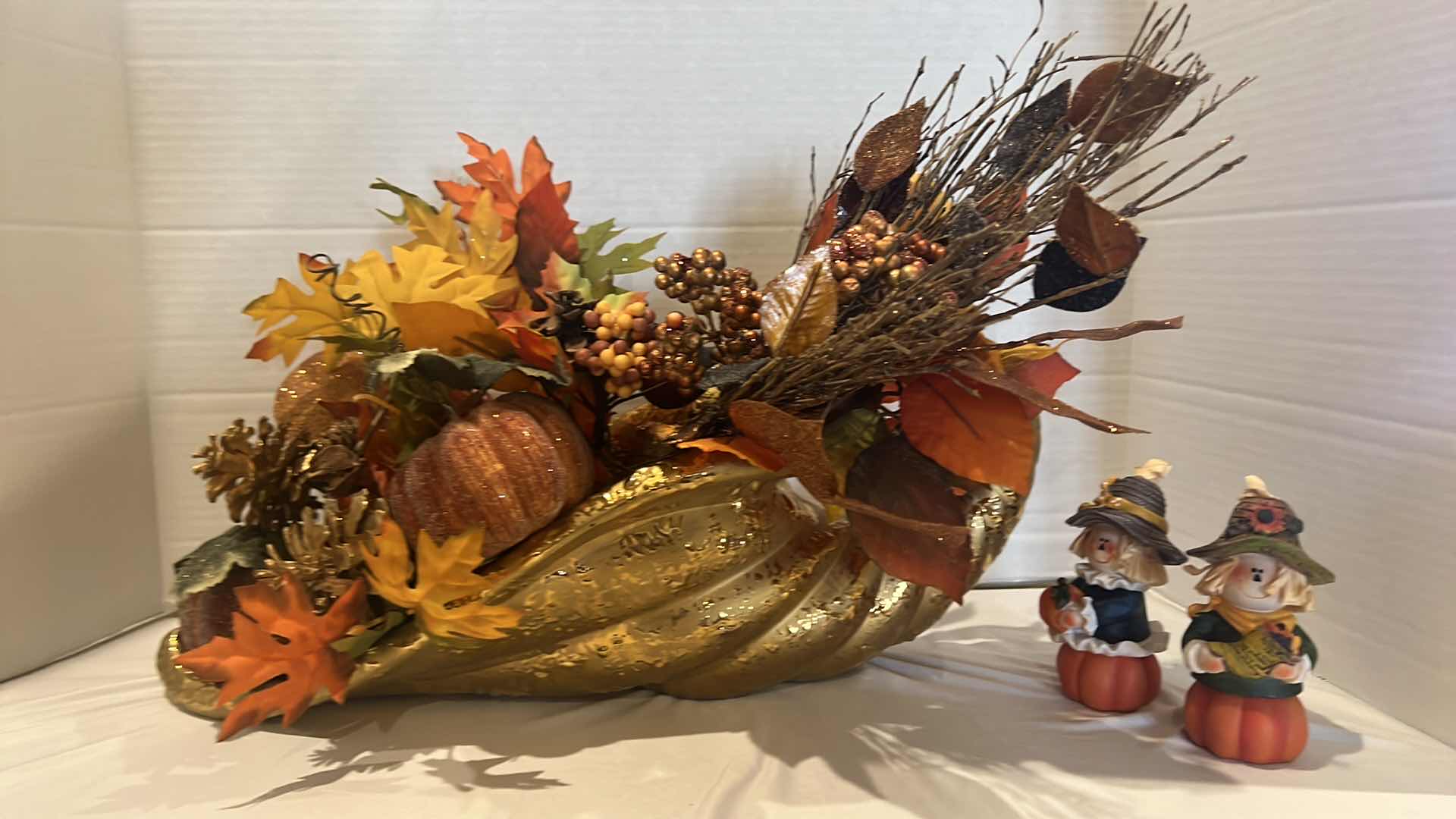 Photo 3 of GOLD METAL CORNUCOPIA FALL FAUX FLORAL ARRANGEMENT W20", 2-WOOD PILGRIM FIGURINES H5"