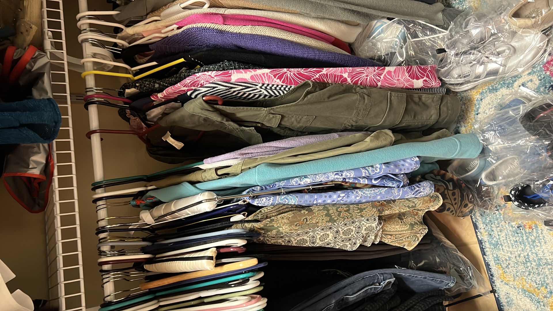 Photo 3 of CONTENTS OF PRIMARY CLOSET RACK-WOMEN'S CLOTHES (PANT APPROX SIZE 12-14)