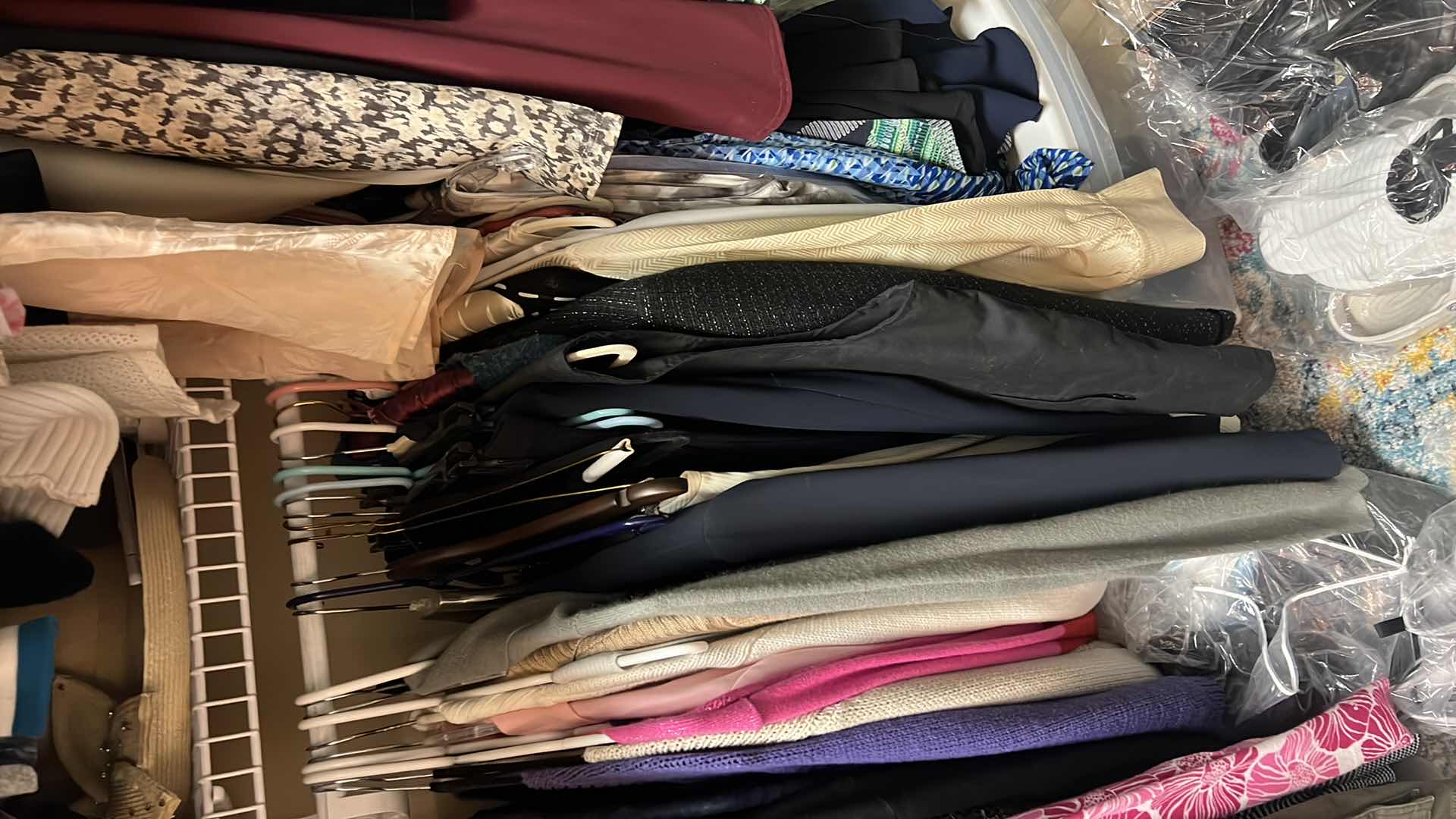 Photo 4 of CONTENTS OF PRIMARY CLOSET RACK-WOMEN'S CLOTHES (PANT APPROX SIZE 12-14)