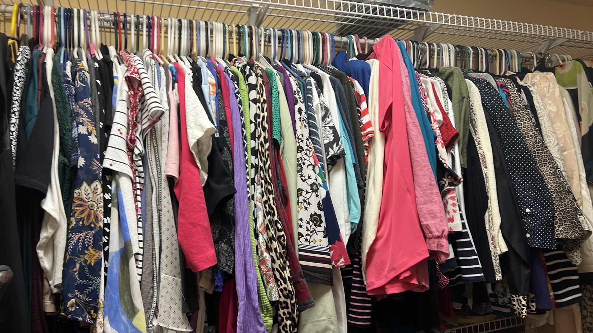 Photo 1 of CONTENTS OF PRIMARY CLOSET RACK-WOMEN'S CLOTHES (APPROX SIZE XL-2x)