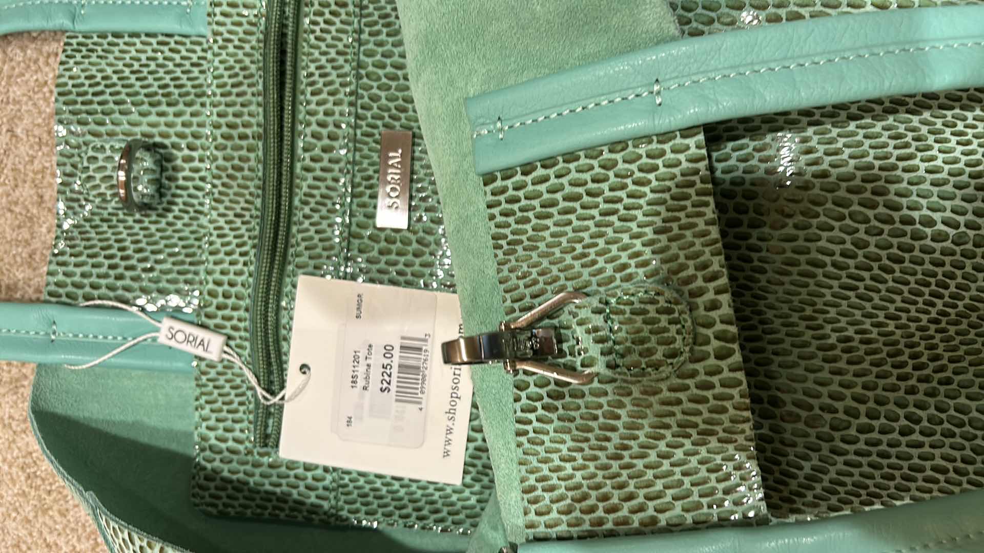 Photo 2 of SHOP SORIEL.COM RUBINA GREEN SNAKESKIN TOTE $225.