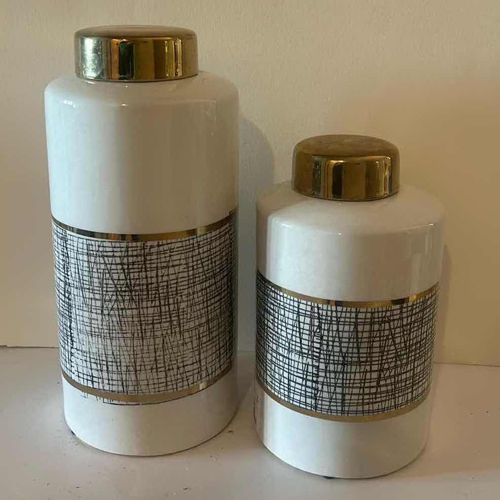 Photo 1 of HOME DECOR- 2 BLACK, WHITE & GOLD LIDDED JARS (TALLEST H 13”