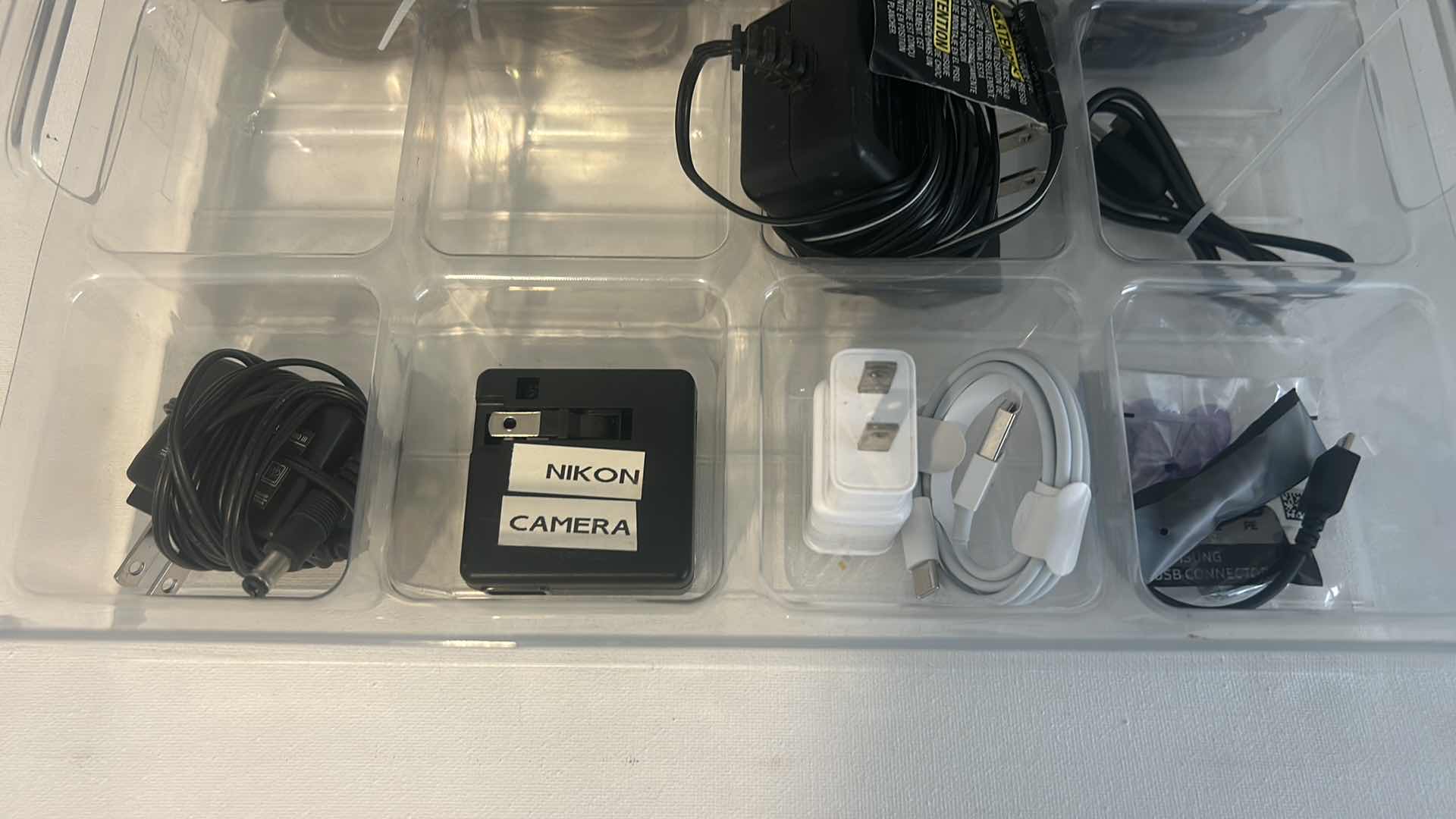 Photo 1 of CHARGING CORDS IN ACRYLIC ORGANIZER