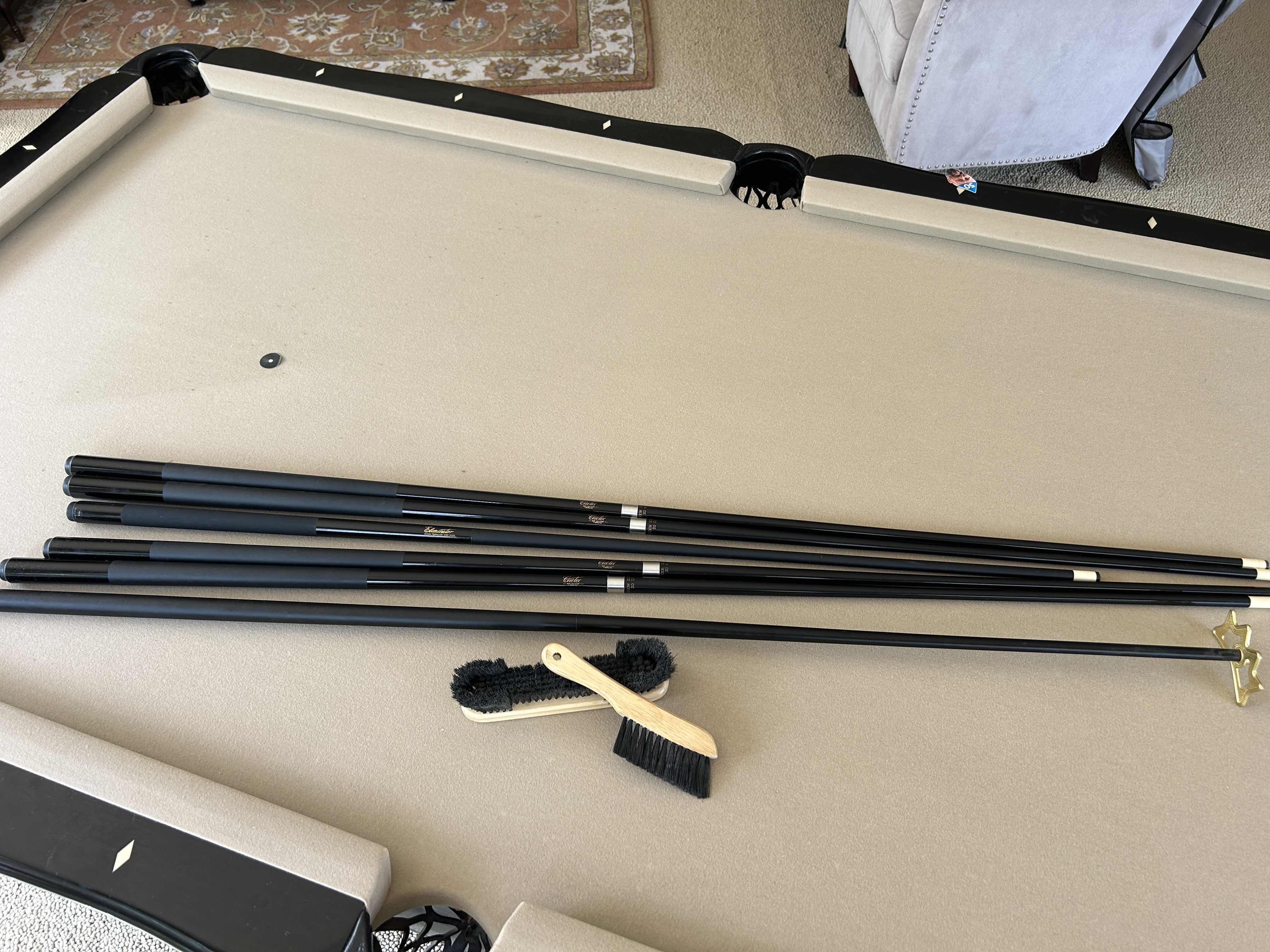 Photo 1 of POOL CUE  STICKS & POOL TABLE ACCESSORIES