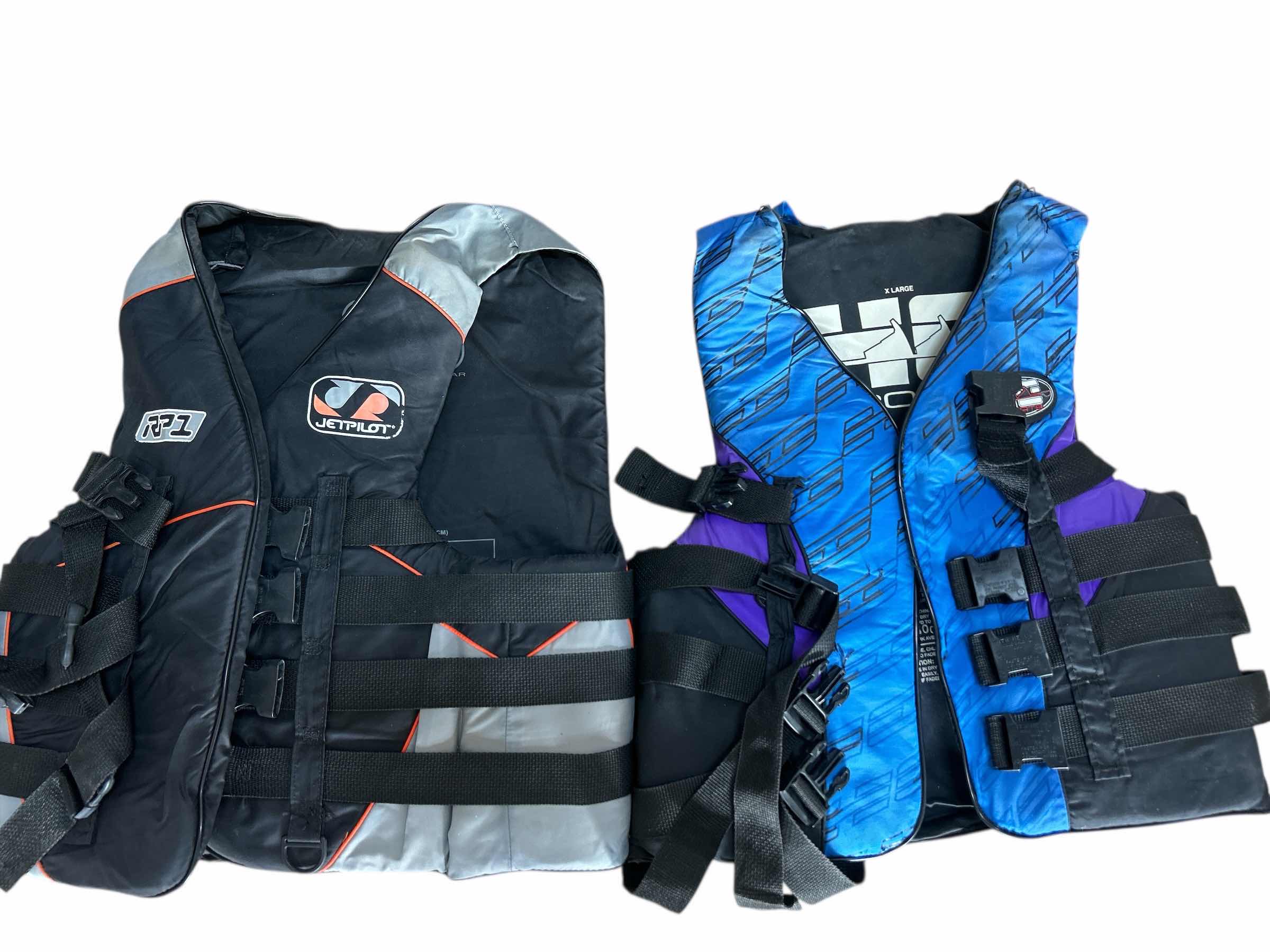 Photo 1 of 2 ADULT LIFE VESTS
