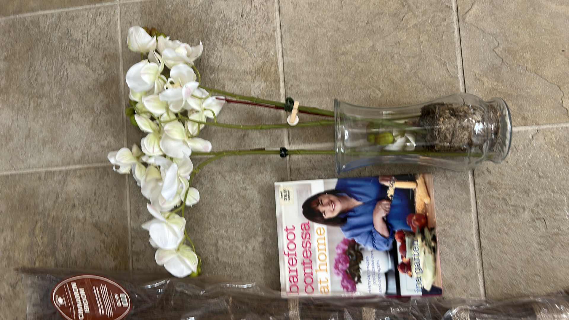 Photo 1 of HOUSEHOLD ASSORTMENT- WIRE RACKS, CINNAMON BROOM, HARDCOVER BOOK, FAUX ORCHID IN GLASS VASE