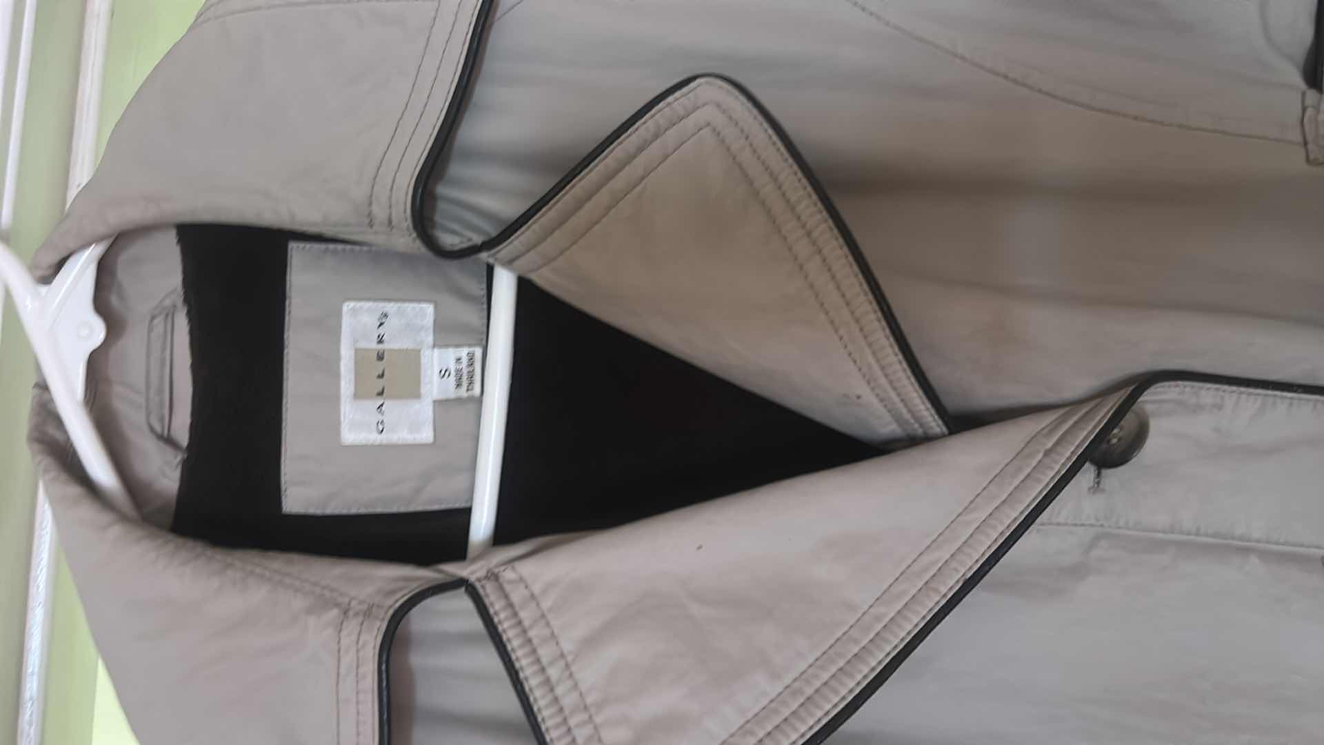 Photo 1 of WOMENSWEAR- 2 WOMENS RAINCOATS SIZE SM AND LARGE