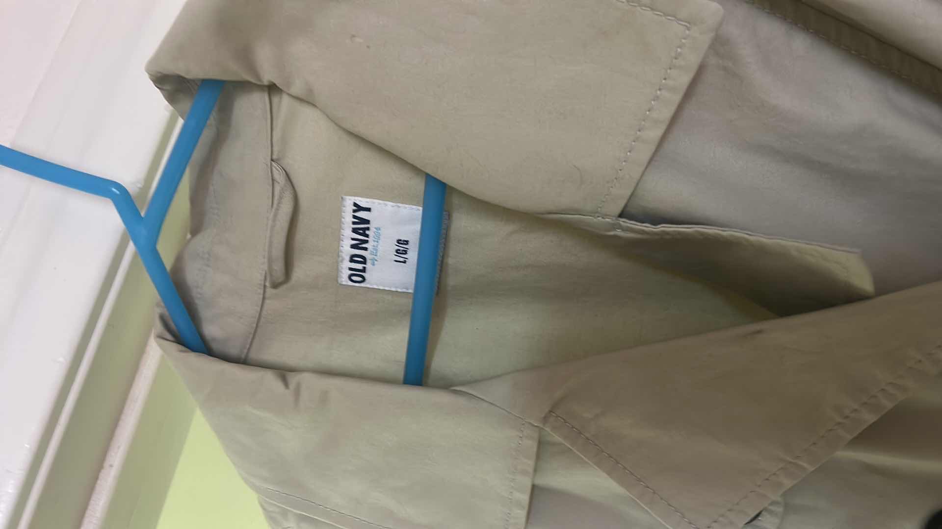 Photo 1 of WOMENSWEAR- 2 WOMENS RAINCOATS SIZE SM AND LARGE