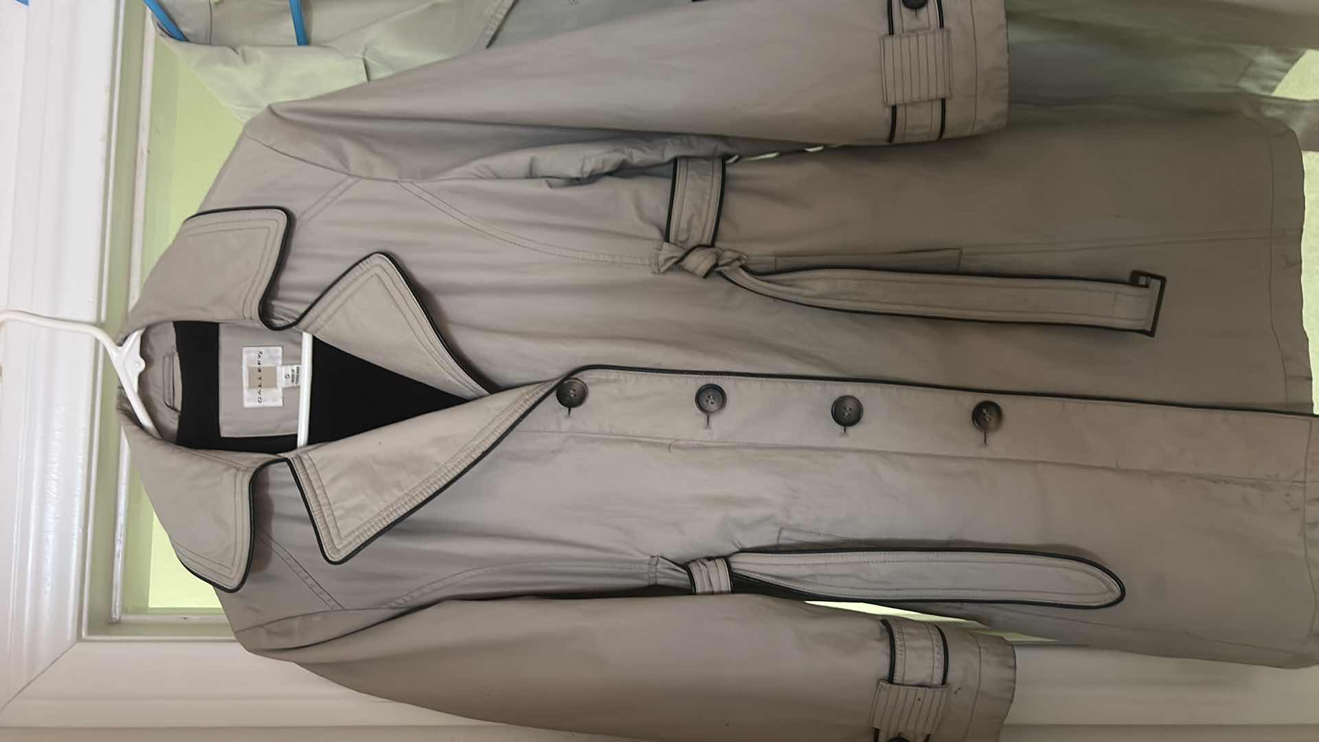 Photo 1 of WOMENSWEAR- 2 WOMENS RAINCOATS SIZE SM AND LARGE