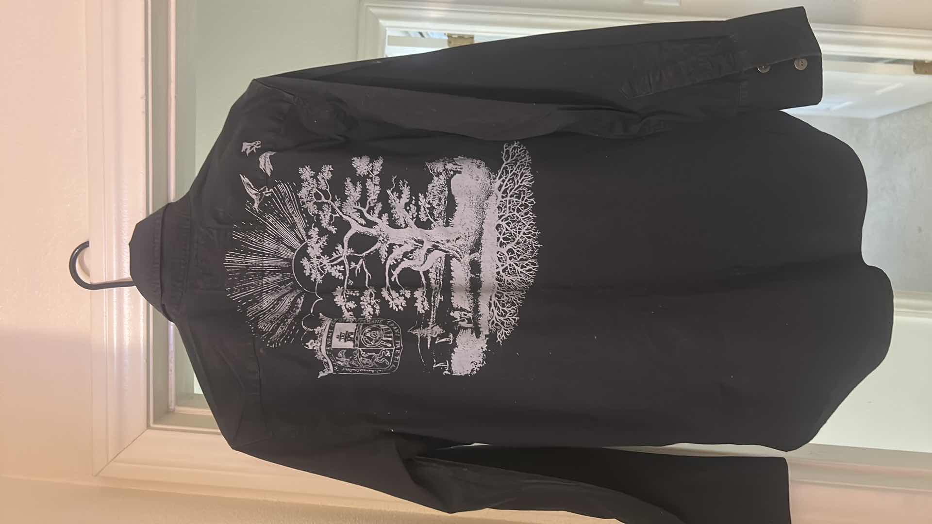 Photo 1 of WOMENSWEAR.- 2 BLACK LONG SLEEVE GRAPHIC  SHIRTS SIZE MED