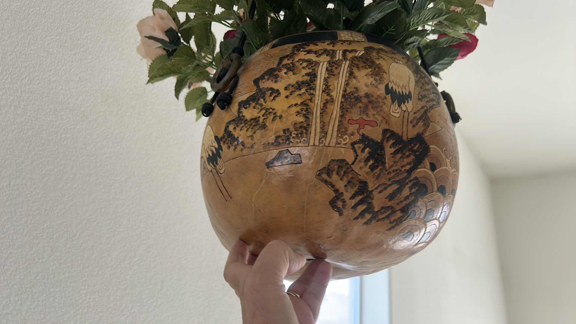 Photo 1 of LARGE HAND-PAINTED HANGING GOURD WITH FAUX FLOWERS EST 6’