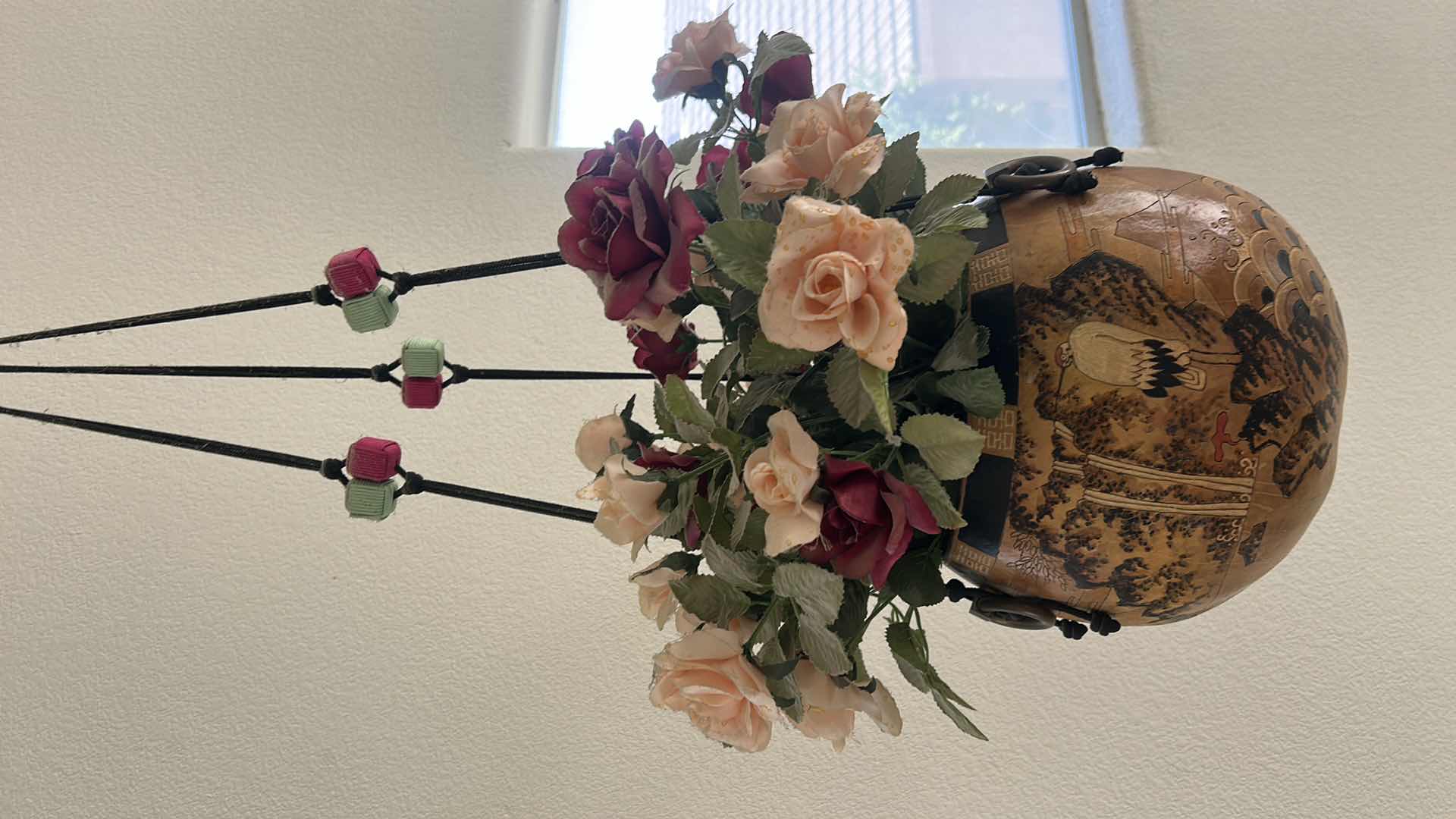 Photo 1 of LARGE HAND-PAINTED HANGING GOURD WITH FAUX FLOWERS EST 6’