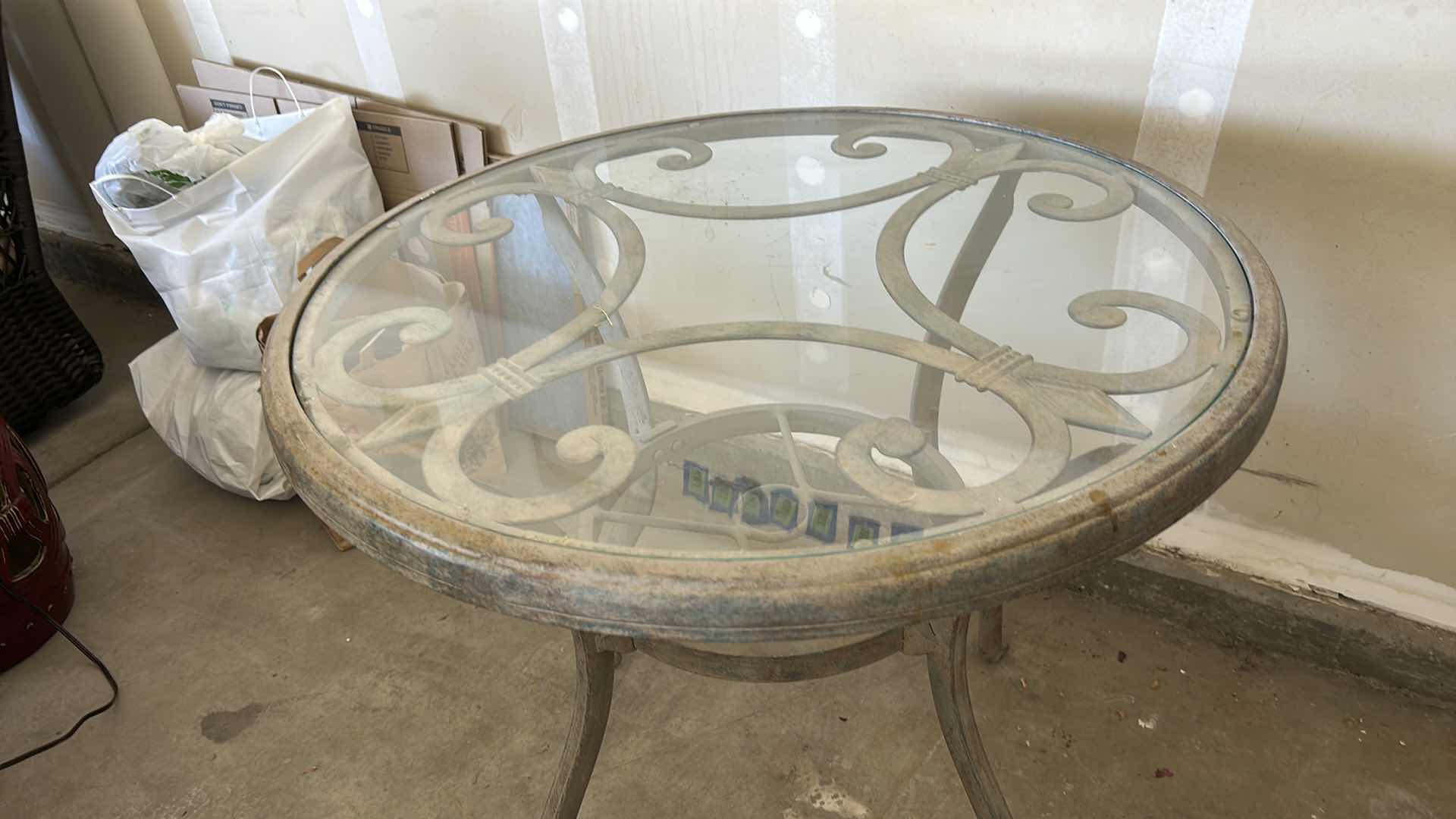 Photo 1 of OUTDOOR PATIO GLASS TOP TABLE 29.5” x H29”