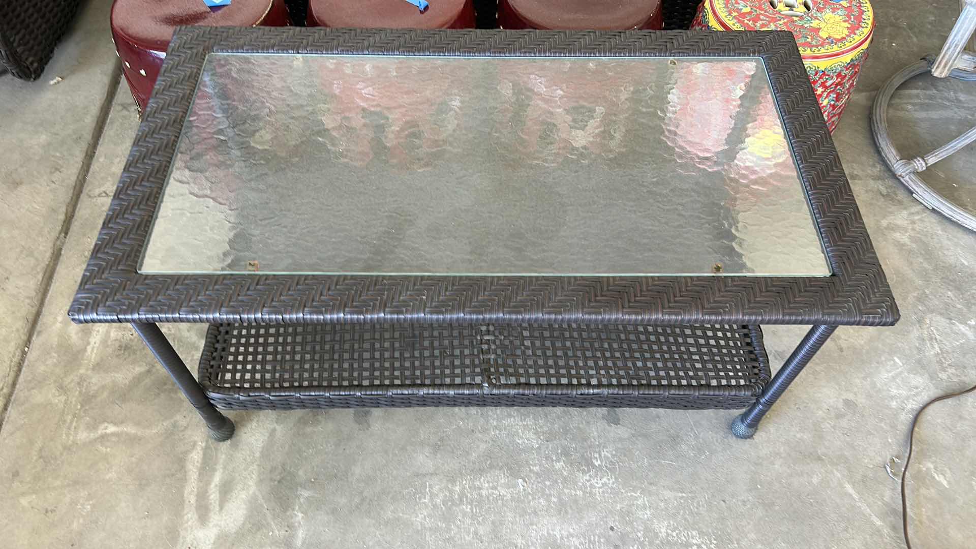 Photo 1 of FAUX WICKER OUTDOOR COCKTAIL TABLE 39“ x 21 1/2“ x H18“
