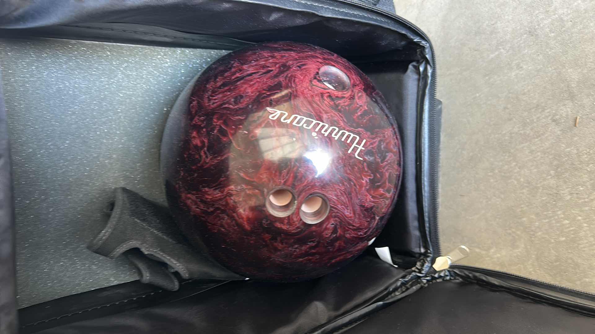 Photo 1 of BRUNSWICK ROLLING BOWLING CASE AND BOWLING BALL