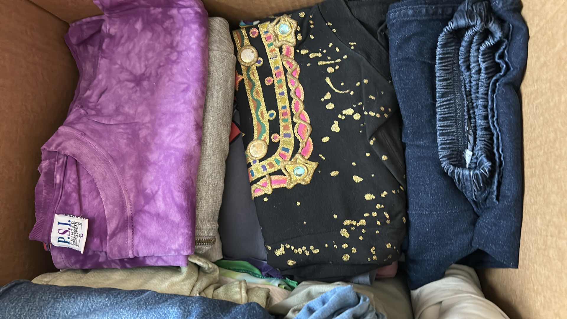 Photo 1 of BOX OF WOMENS CLOTHING, BLOUSES, SHIRTS AND PANTS (ASSORTED SIZES)