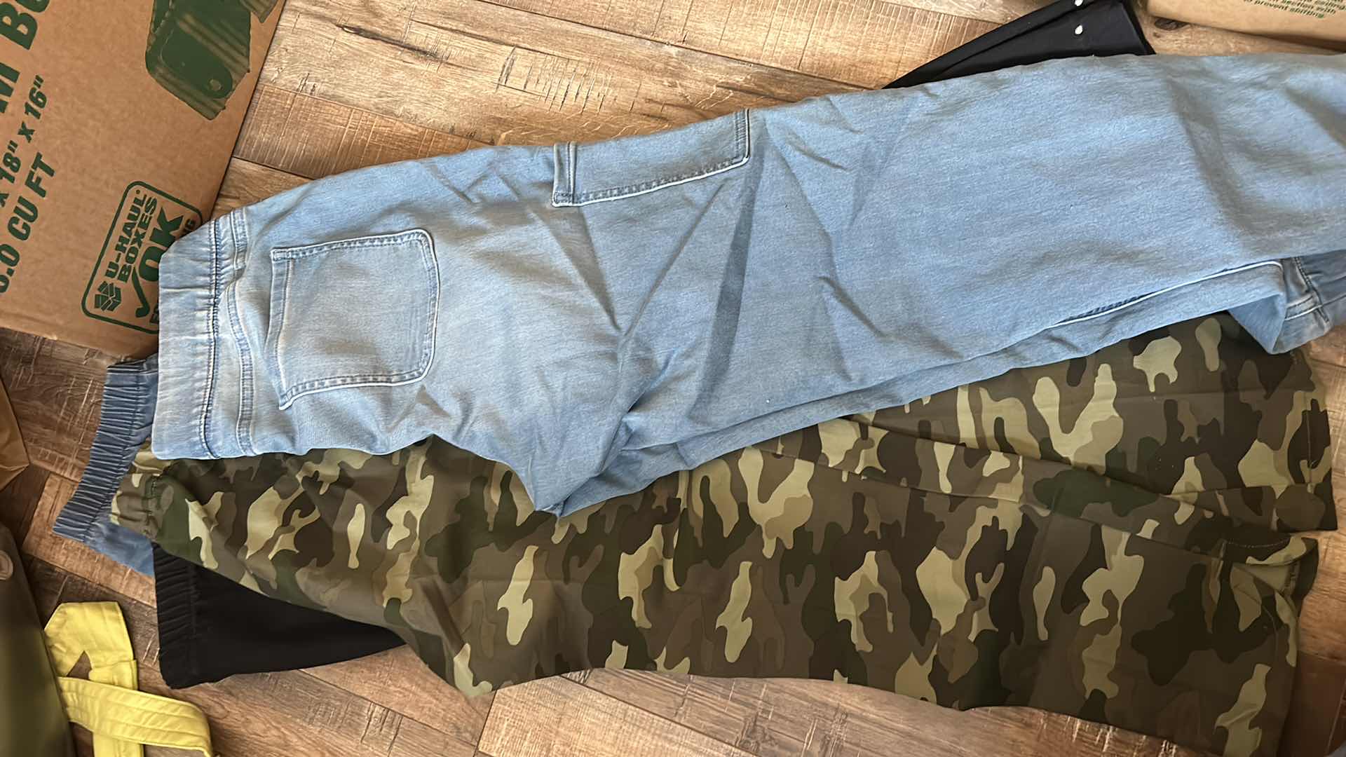 Photo 1 of BOX OF WOMENS CLOTHING, BLOUSES, SHIRTS AND PANTS (ASSORTED SIZES)