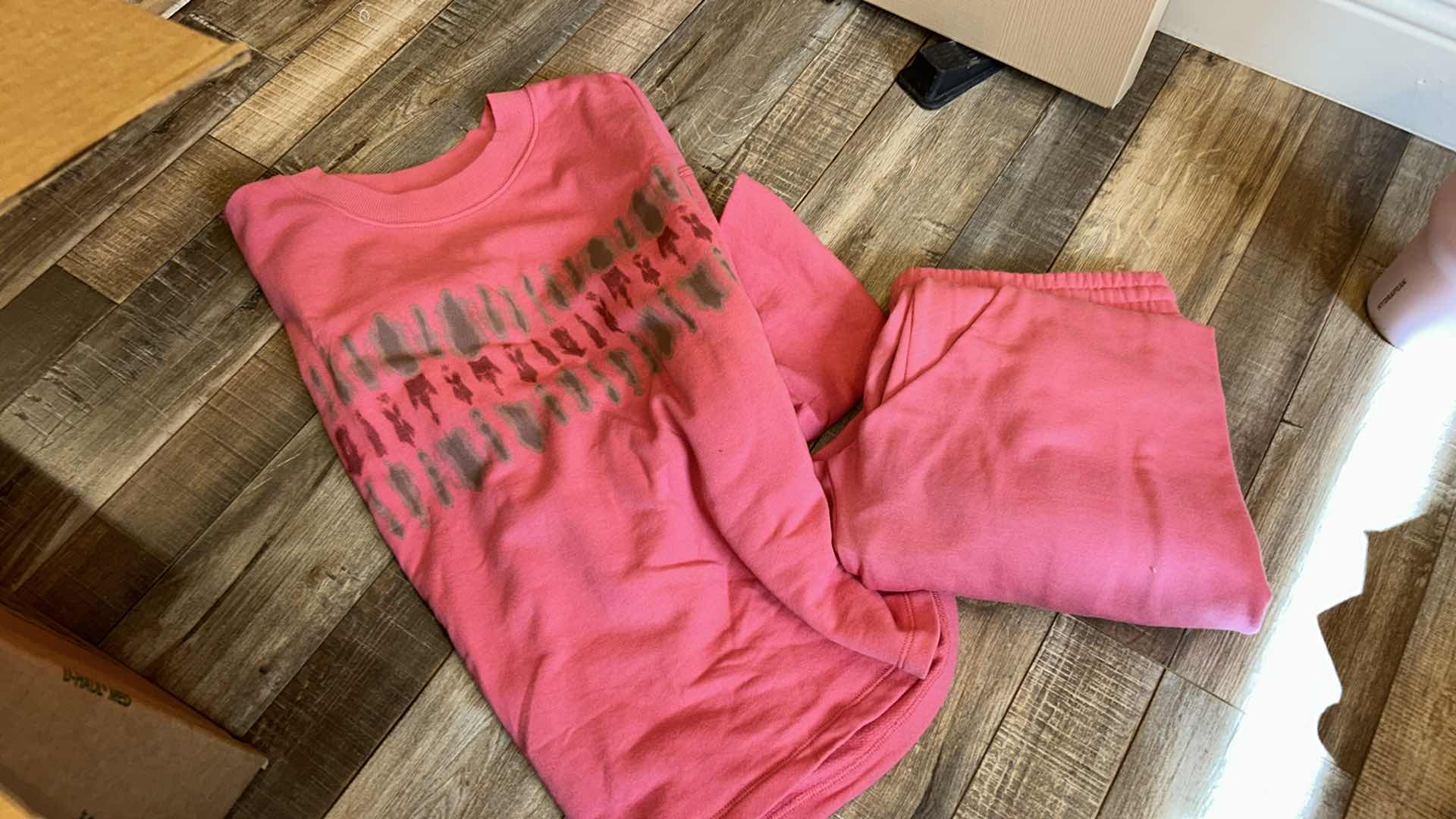 Photo 1 of BOX OF WOMENS LOUNGEWEAR, SWEATS AND HATS SOME NEW WITH TAGS (ASSORTED SIZES)