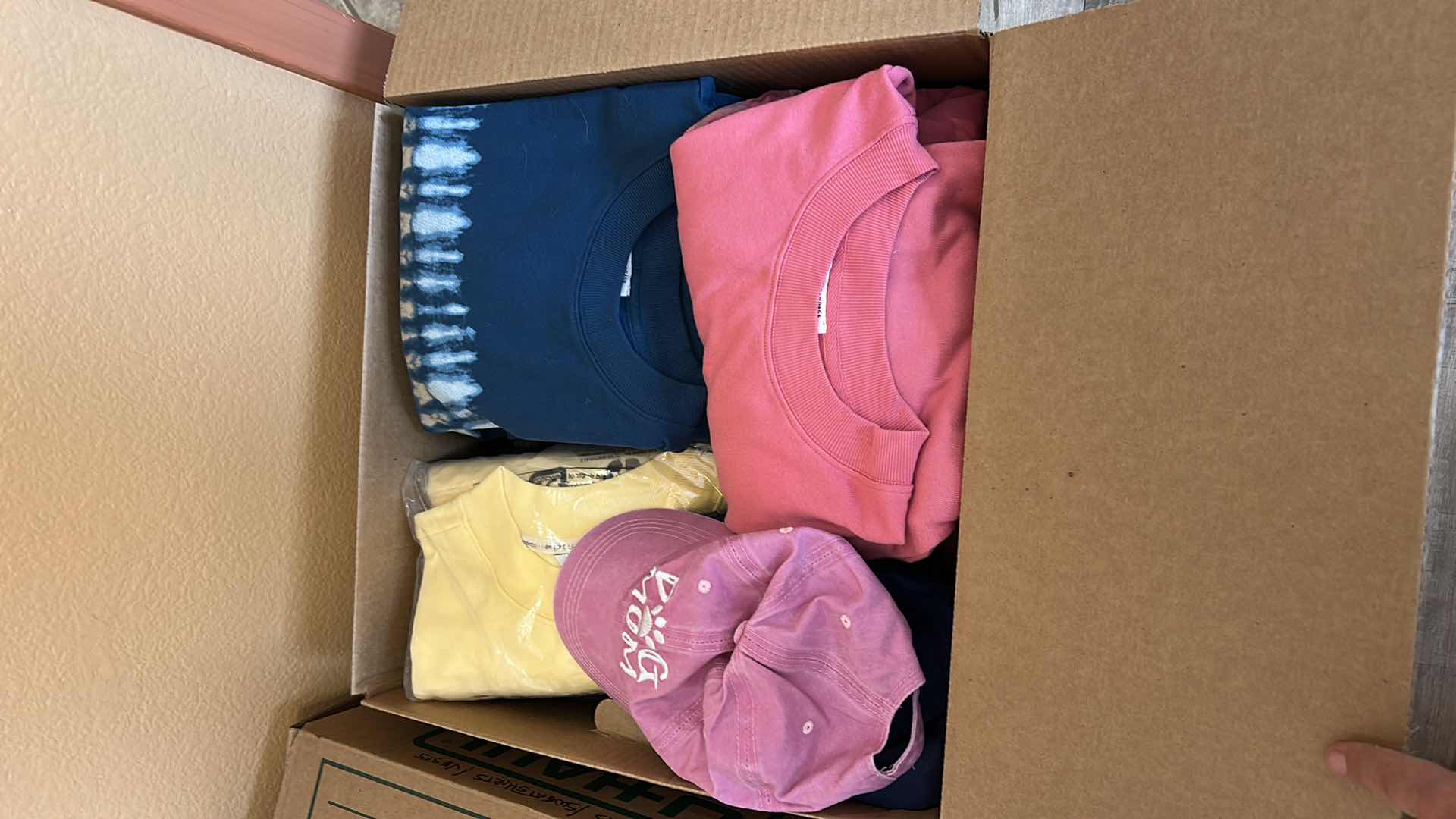 Photo 1 of BOX OF WOMENS LOUNGEWEAR, SWEATS AND HATS SOME NEW WITH TAGS (ASSORTED SIZES)