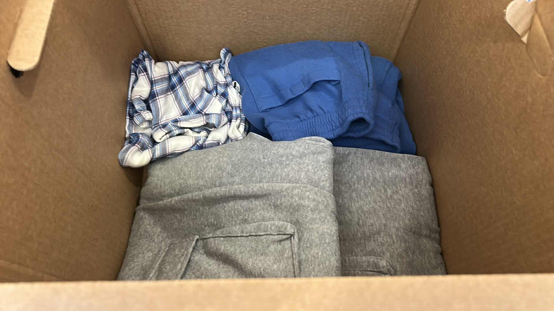 Photo 1 of BOX OF WOMENS LOUNGEWEAR, SWEATS AND HATS SOME NEW WITH TAGS (ASSORTED SIZES)