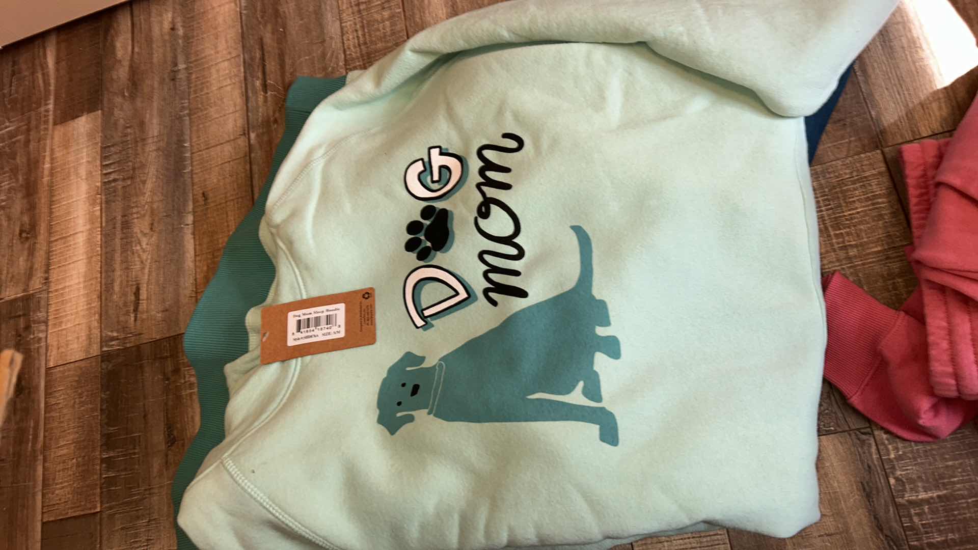 Photo 1 of BOX OF WOMENS LOUNGEWEAR, SWEATS AND HATS SOME NEW WITH TAGS (ASSORTED SIZES)