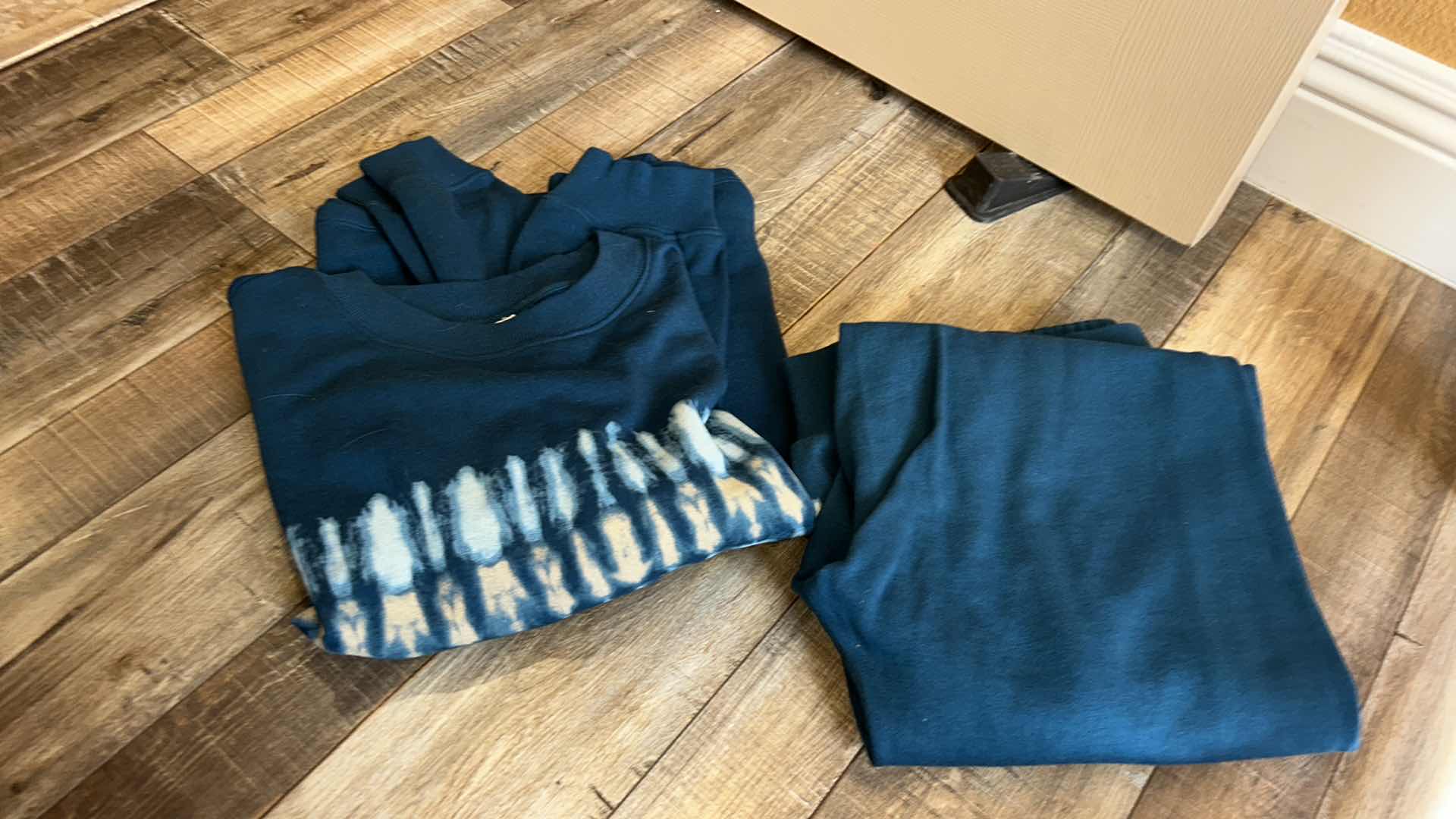 Photo 1 of BOX OF WOMENS LOUNGEWEAR, SWEATS AND HATS SOME NEW WITH TAGS (ASSORTED SIZES)