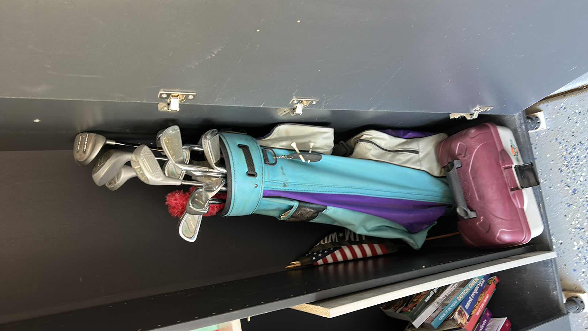 Photo 1 of CONTENTS OF CABINET - GOLF CLUB, TACKLE BOX AND FLAGS