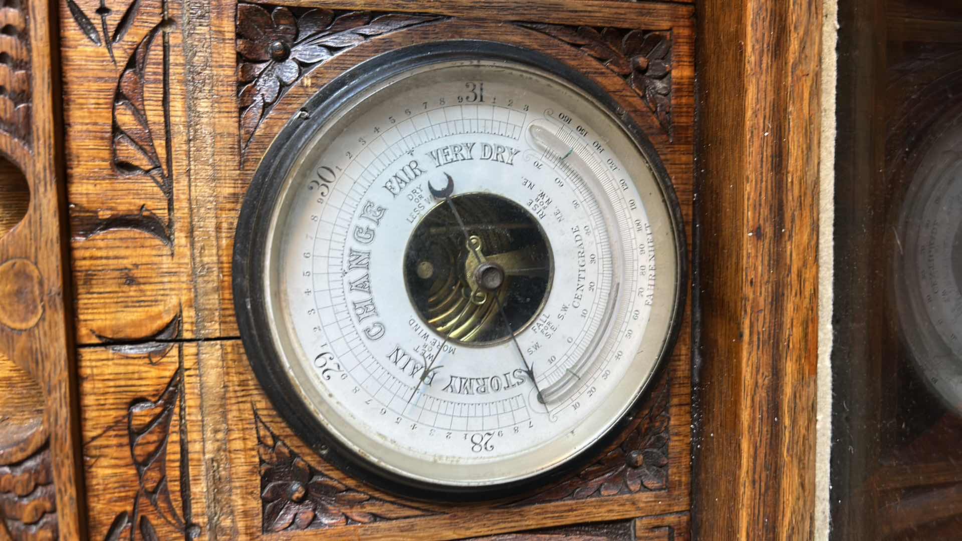 Photo 1 of ANTIQUE BAROMETER IN CARVED WOODEN CASE 14 1/2“ x 4 1/2“ x H10.75”
