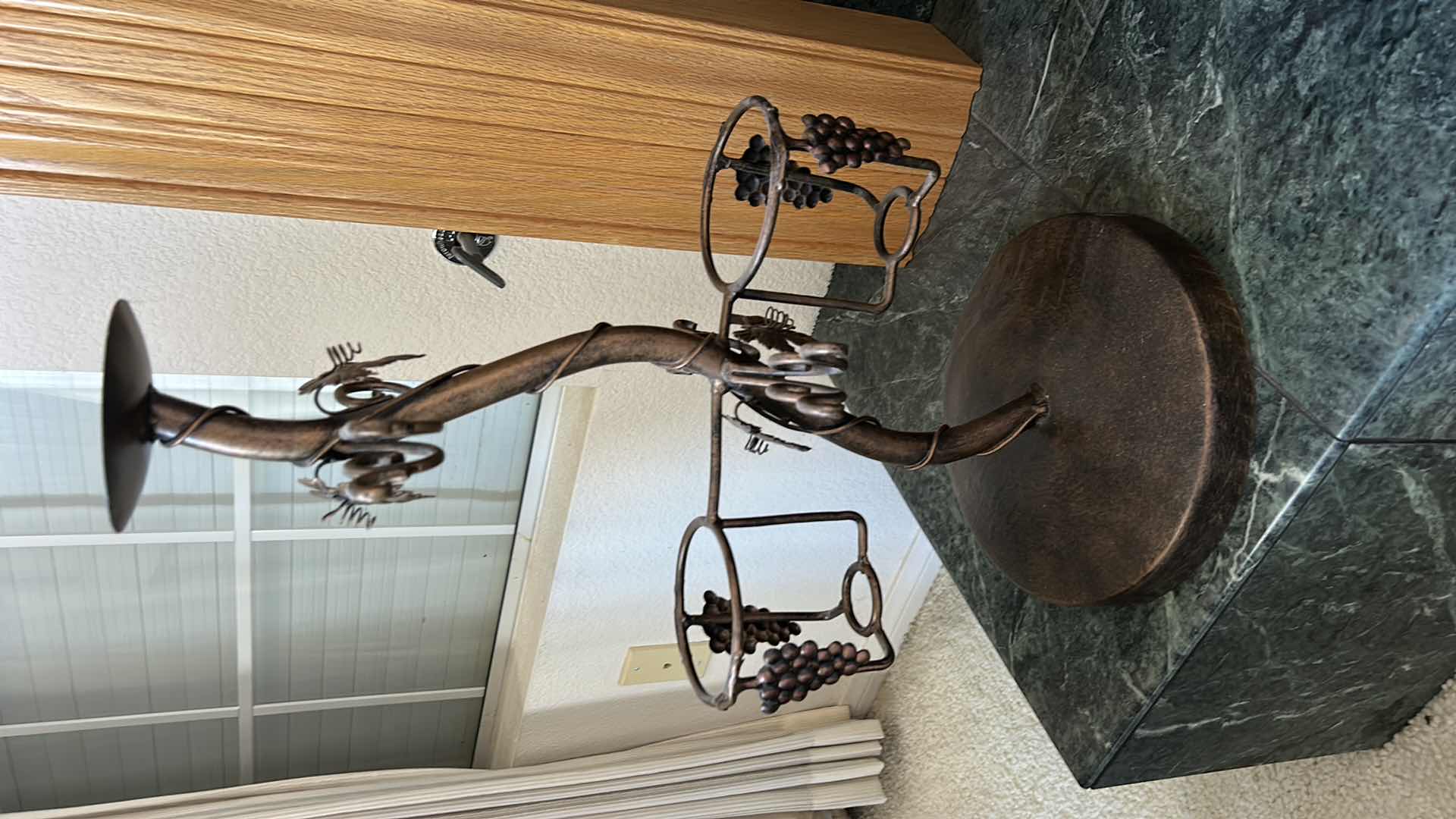 Photo 1 of METAL CANDLE HOLDER AND WINE BOTTLE STAND H23”