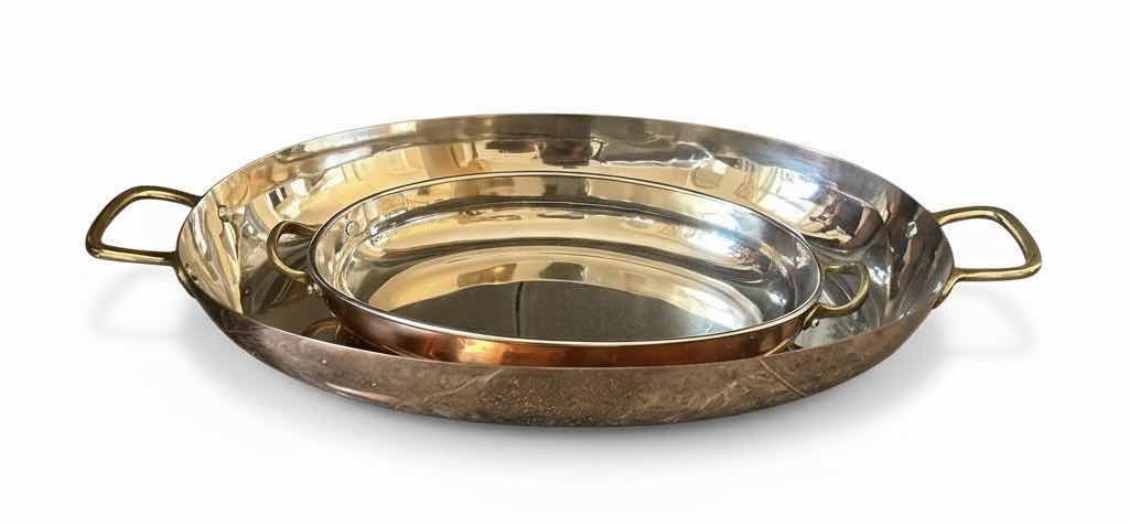 Photo 1 of 2 COPPER AND STAINLESS STEEL OVAL SERVING DISHES WITH BRASS HANDLES (LARGEST 19.5”)
