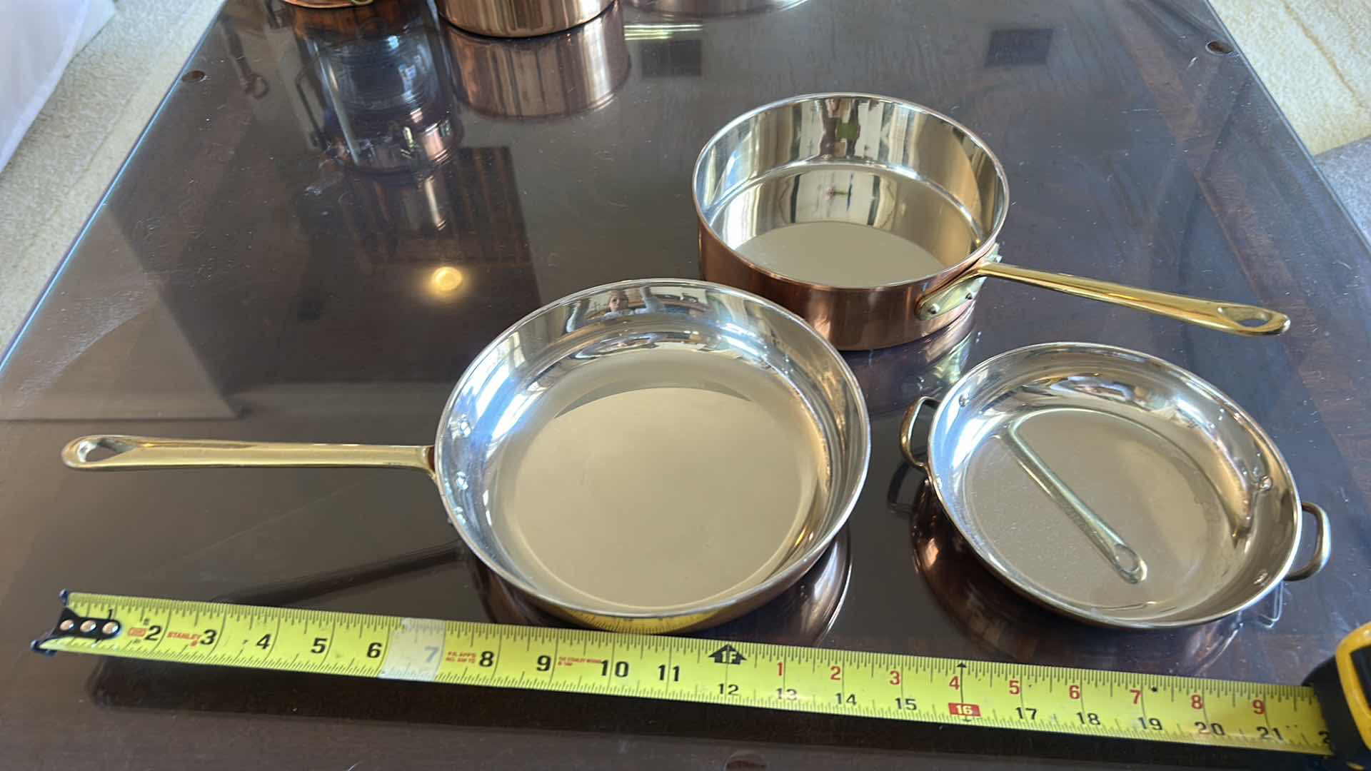 Photo 1 of 3 COPPER AND STAINLESS STEEL  SKILLETS AND PAN WITH BRASS HANDLES