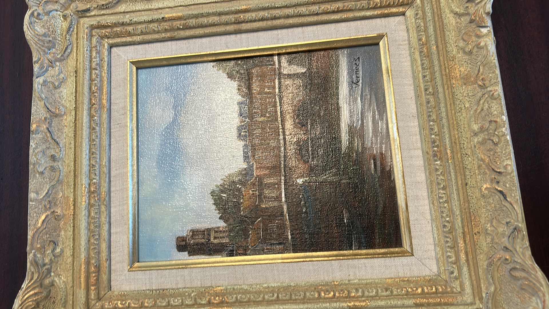 Photo 1 of ORNATELY WOOD AND RESIN FRAMED,  "VERMEES DUTCH TOWN RIVER” SIGNED OIL ON CANVAS, ARTWORK 15 1/2” x H17 1/2”