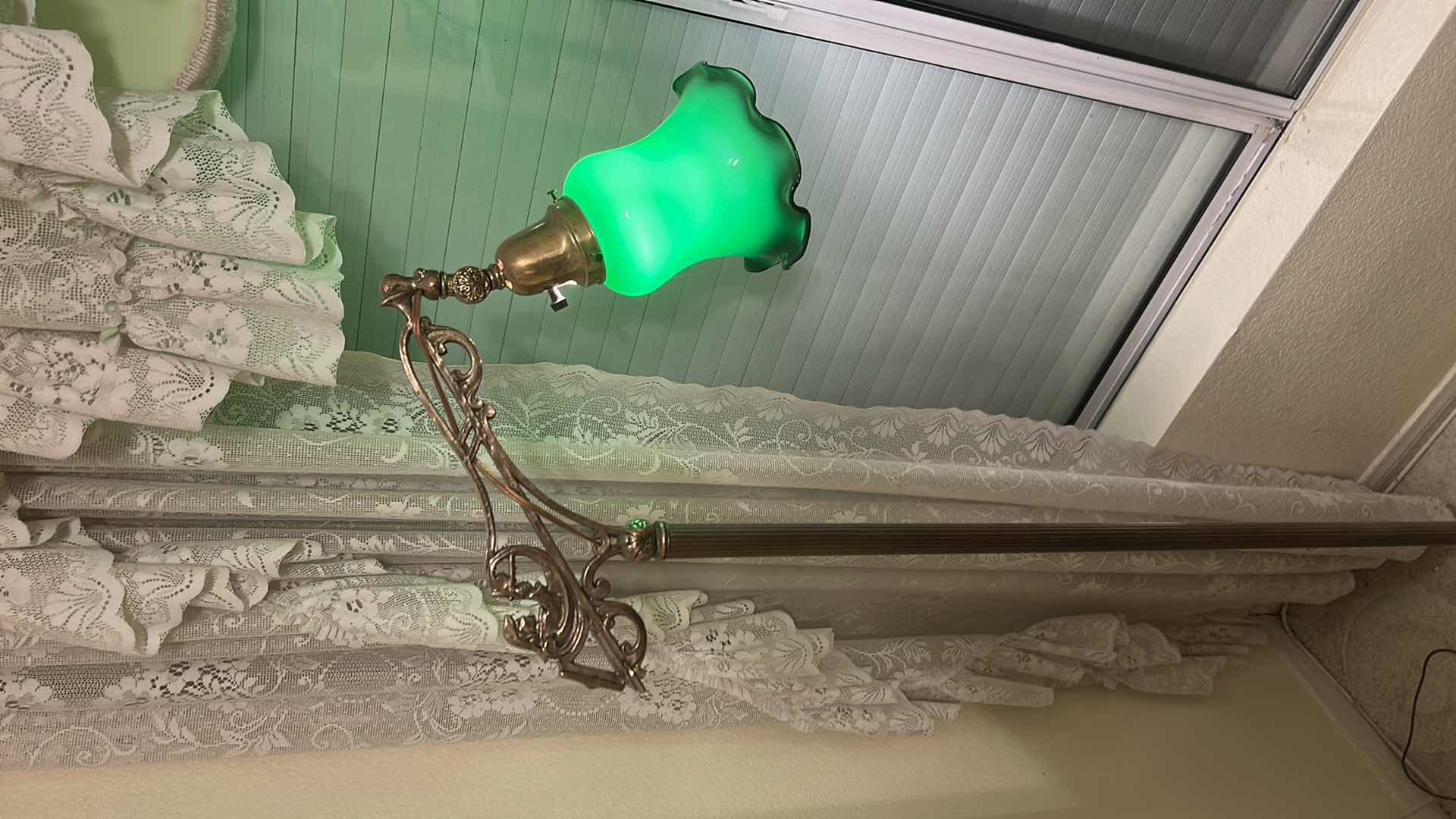 Photo 1 of ANTIQUE HEAVY BRASS LAMP WITH GREEN GLASS SCALLOPED SHADE