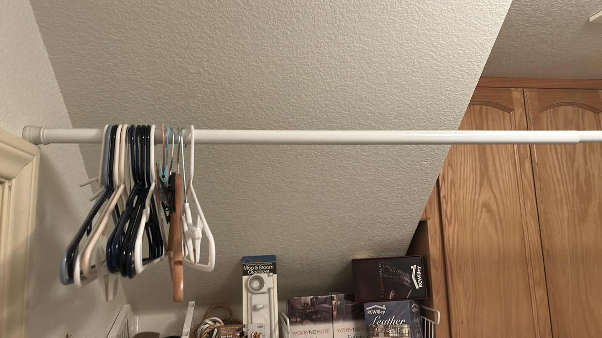 Photo 1 of CONTENTS ON SHELF IN LAUNDRY ROOM- ROD & HANGERS