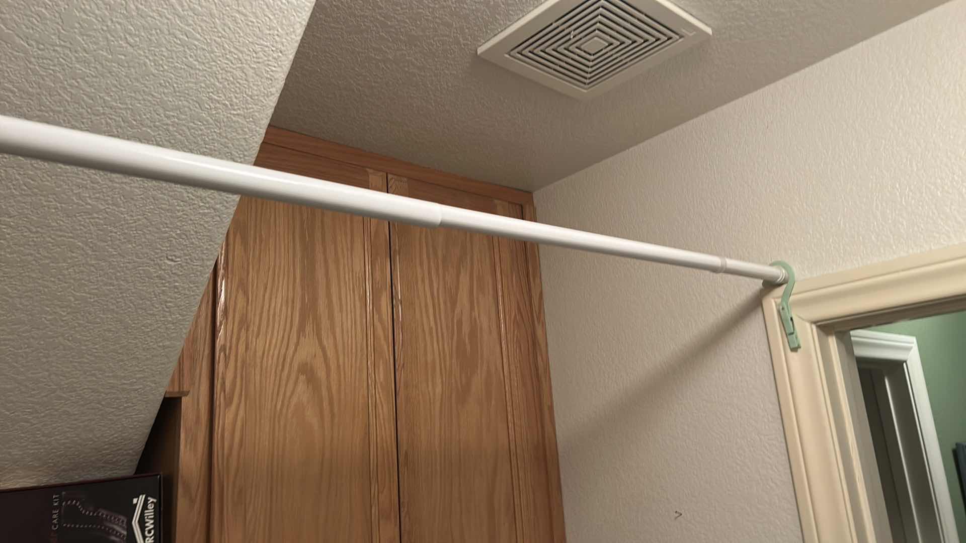 Photo 1 of CONTENTS ON SHELF IN LAUNDRY ROOM- ROD & HANGERS