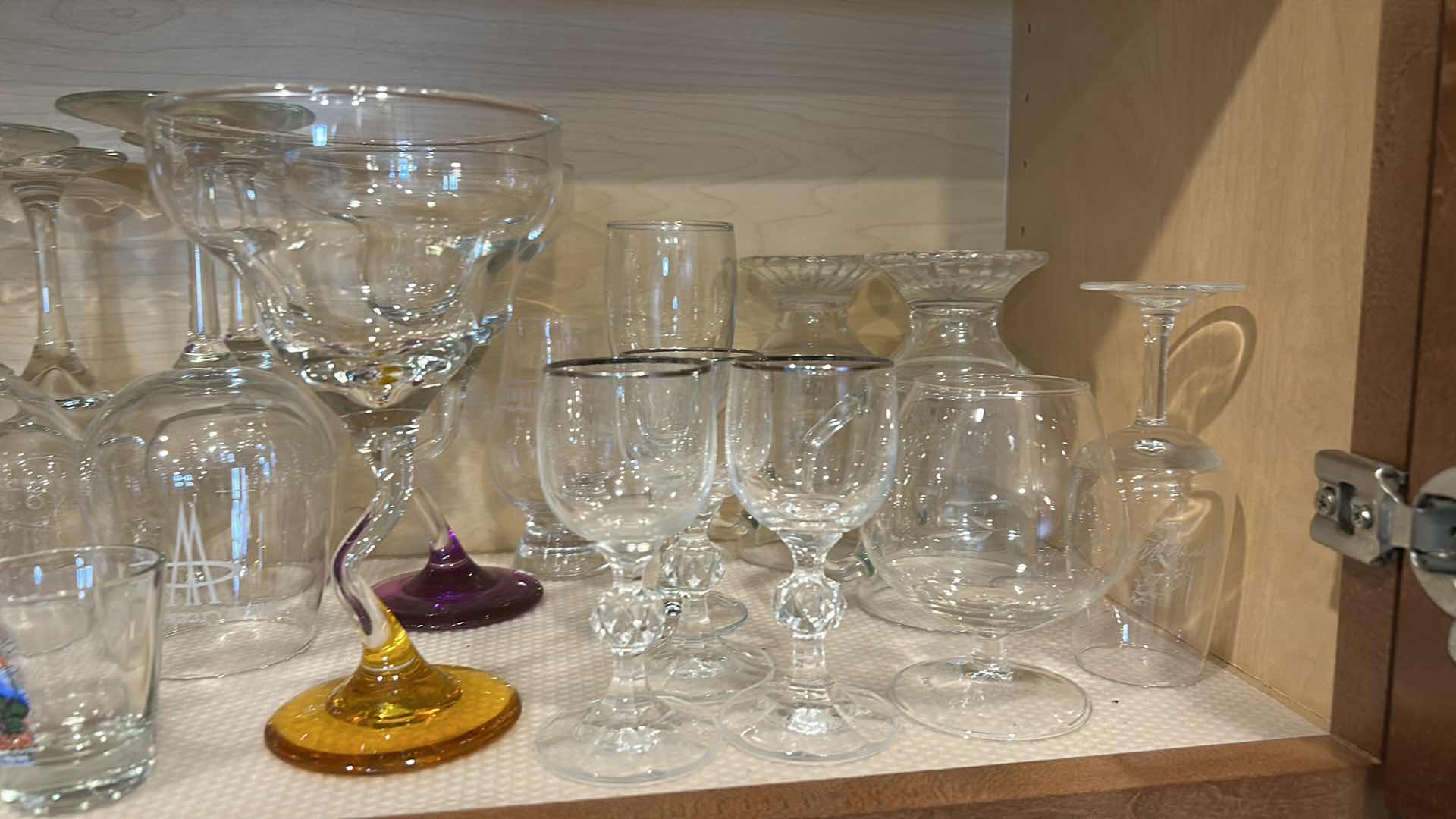 Photo 1 of CONTENTS OF CABINET IN KITCHEN