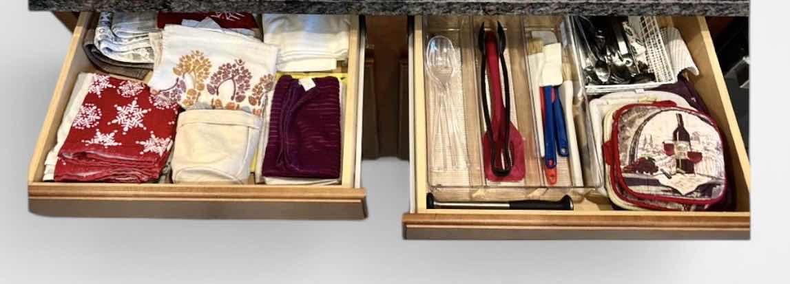 Photo 1 of CONTENTS OF TWO TOP DRAWERS IN KITCHEN