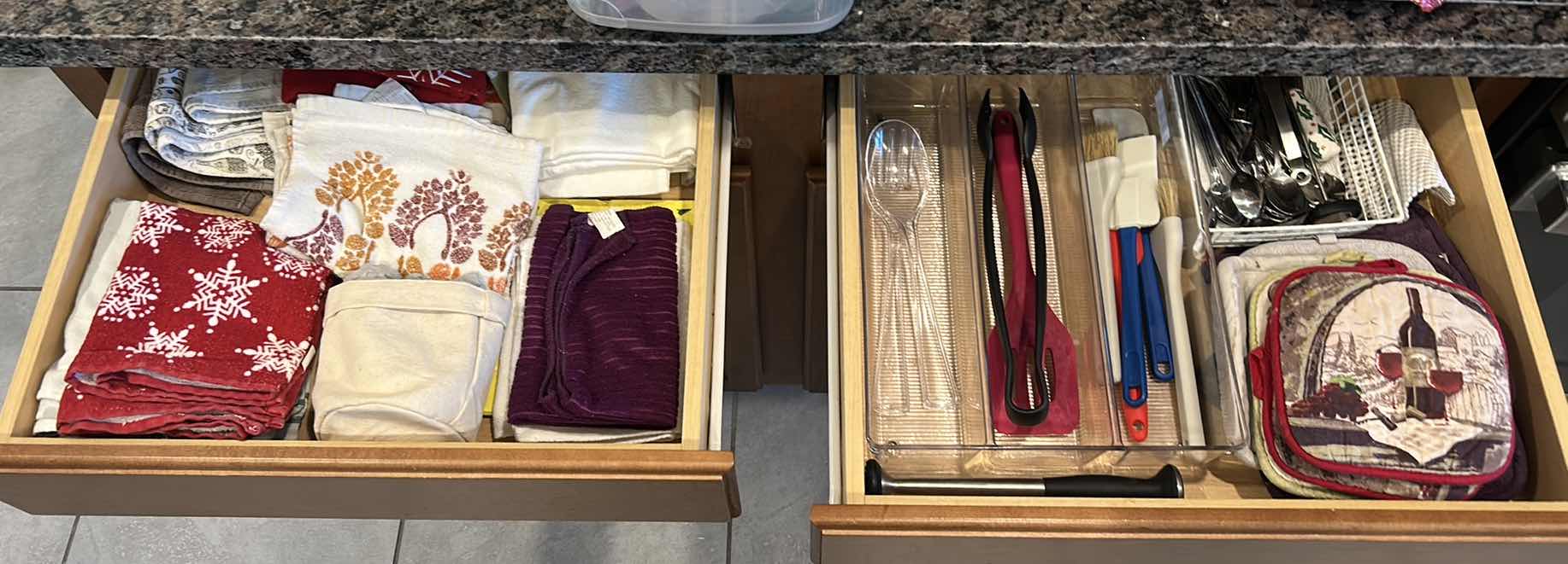 Photo 1 of CONTENTS OF TWO TOP DRAWERS IN KITCHEN