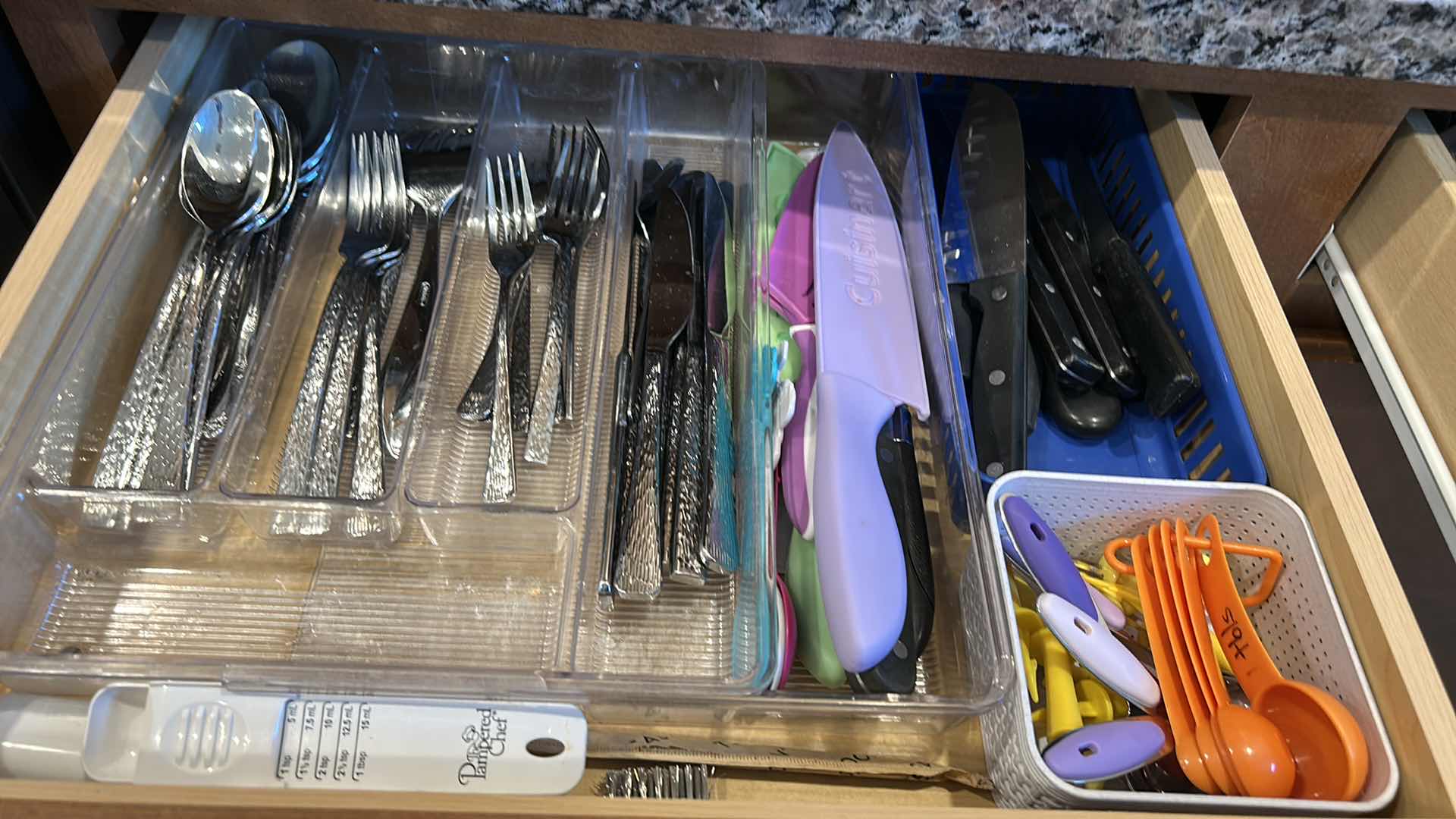 Photo 1 of CONTENTS OF TWO DRAWERS IN KITCHEN