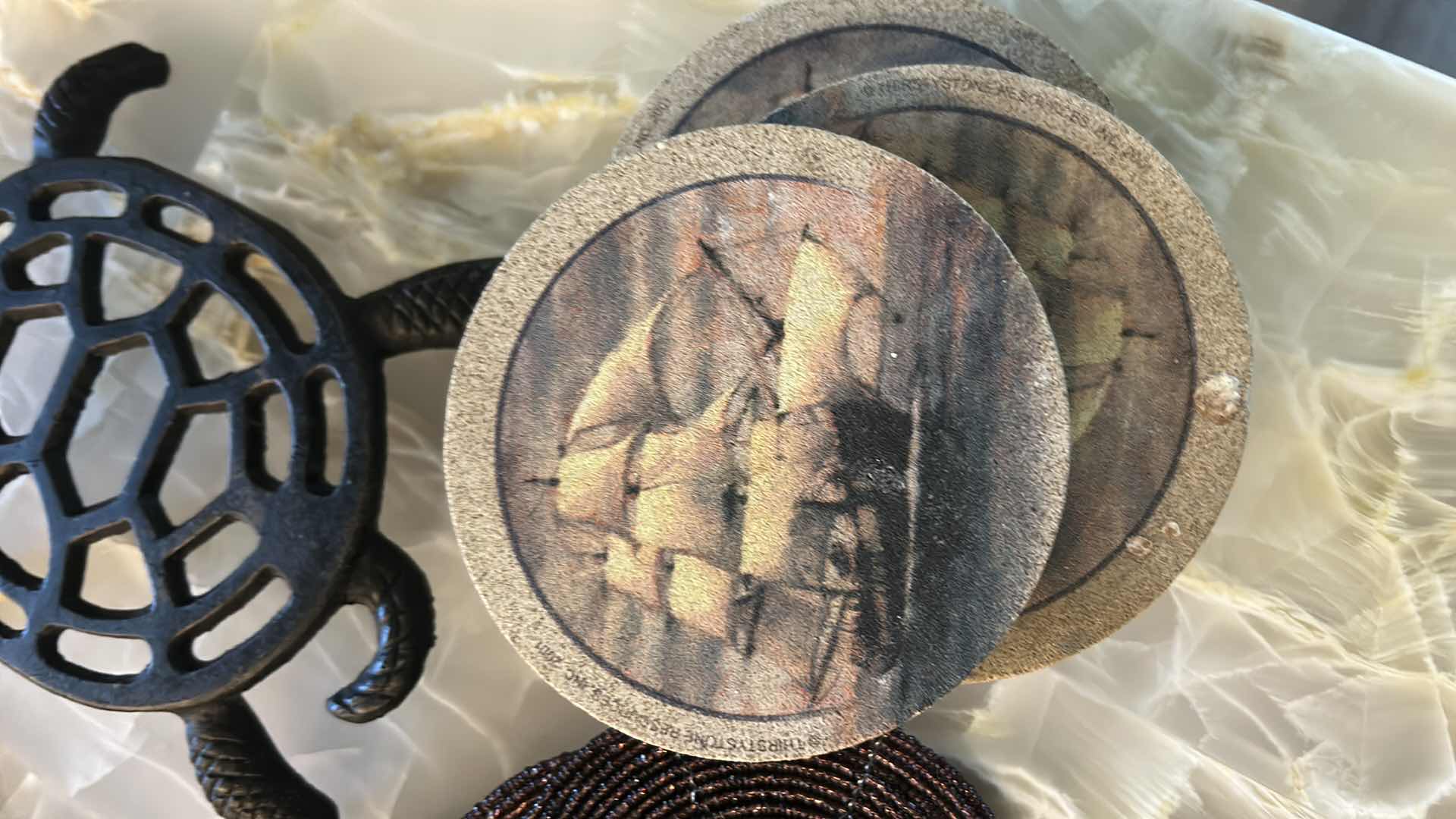 Photo 1 of 2 METAL TRIVETS AND COASTERS